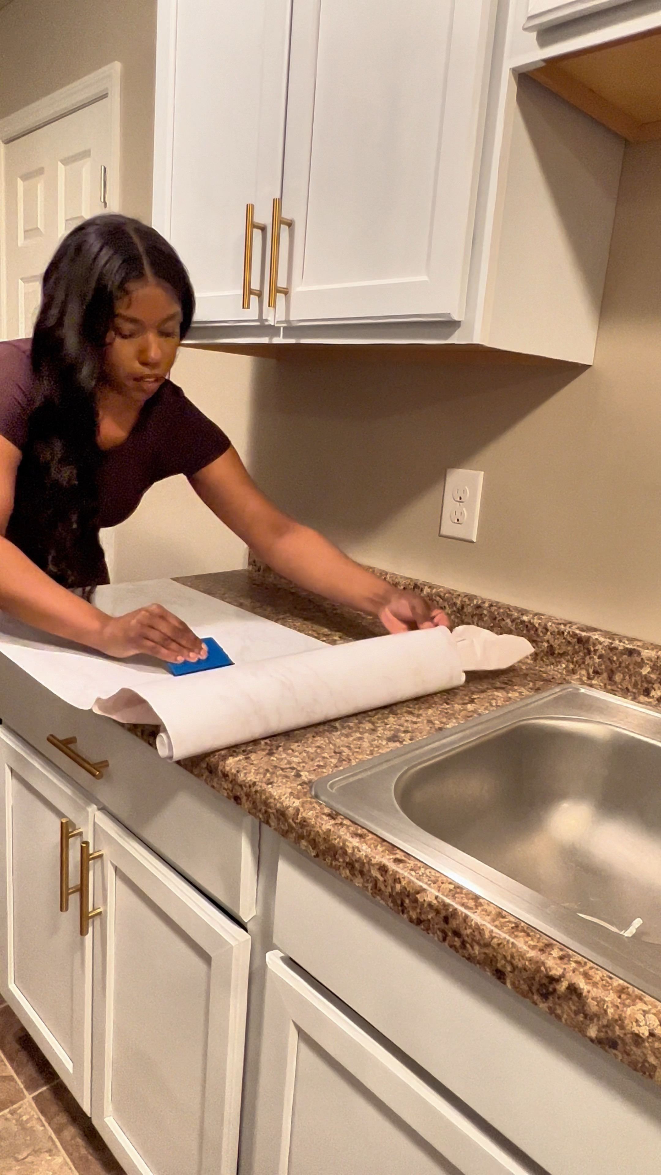 3rd diy rental friendly take down. This countertop paper looks even better in person! My lighting was a lil off. I will hopefully be done next week to show y’all all the swaps together! Still trying to stick to one counter top to go with the black cabinets 😅

#diy #home #shanicelashaystyle #amazonmusthaves #renterfriendly #peelandstickcountertops #kitchremodel 

#LTKhome #LTKSale #LTKunder100