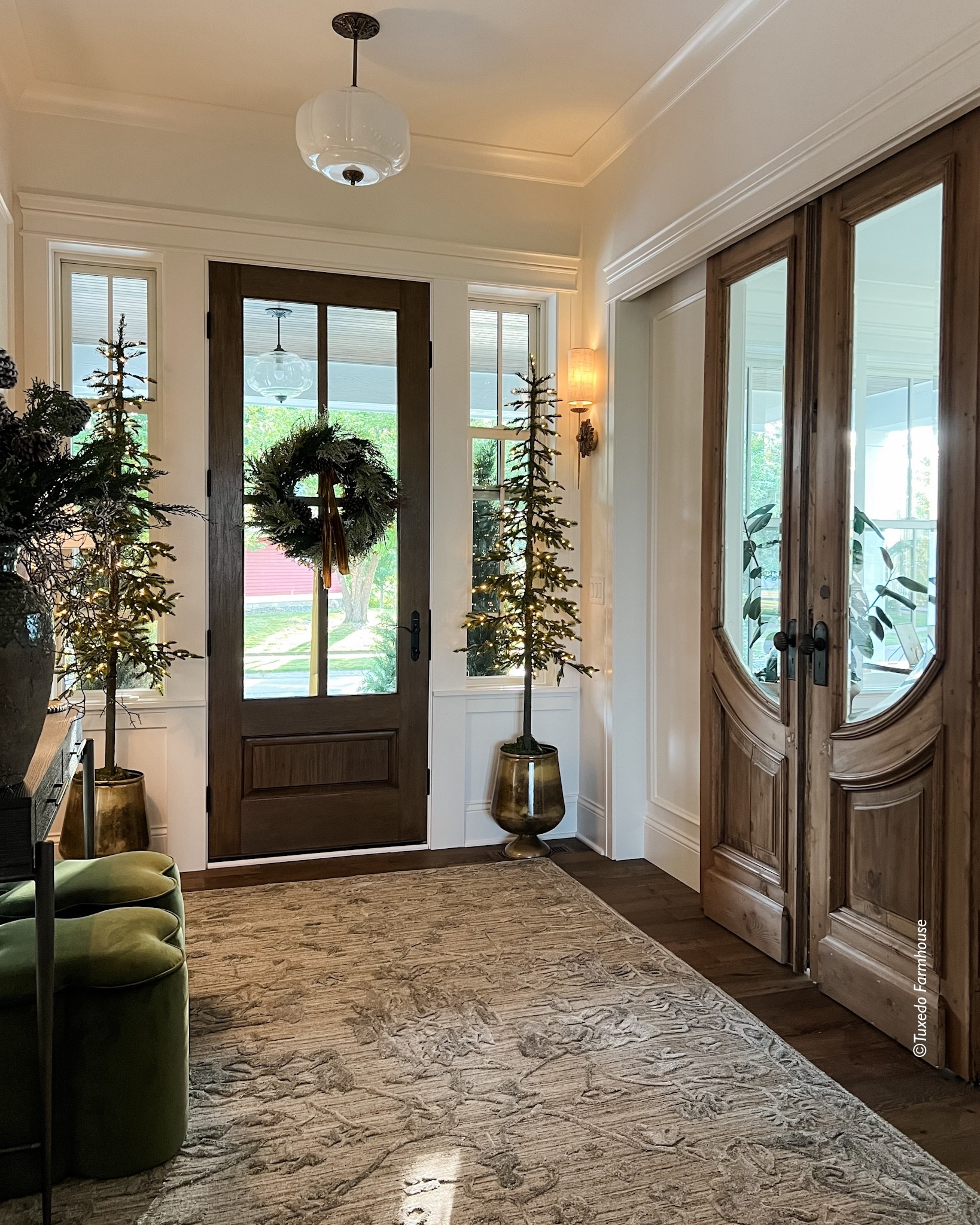 Holiday in my entry for 2025 with a new rug, door wreath, gorgeous brass planters and vintage-inspired holiday art. 

#ltkholiday

#LTKSaleAlert #LTKSeasonal #LTKHome