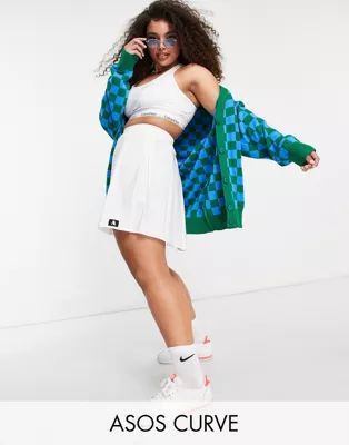 ASOS DESIGN Curve mini pleated tennis skirt with tab detail in white | ASOS (Global)
