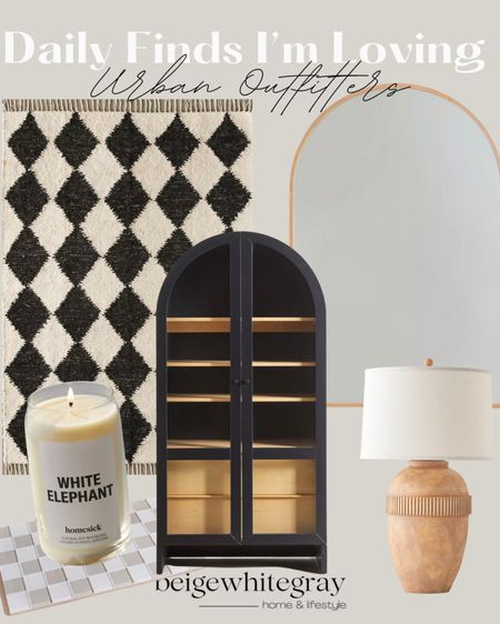 Urban outfitters is having a sale when you purchase through the app!! This arched cabinet is beautiful and a great price!! I absolutely love this checkered rug, arched floor mirror, beautiful lamp!! Beigewhitegray 

#LTKhome #LTKsalealert #LTKSeasonal