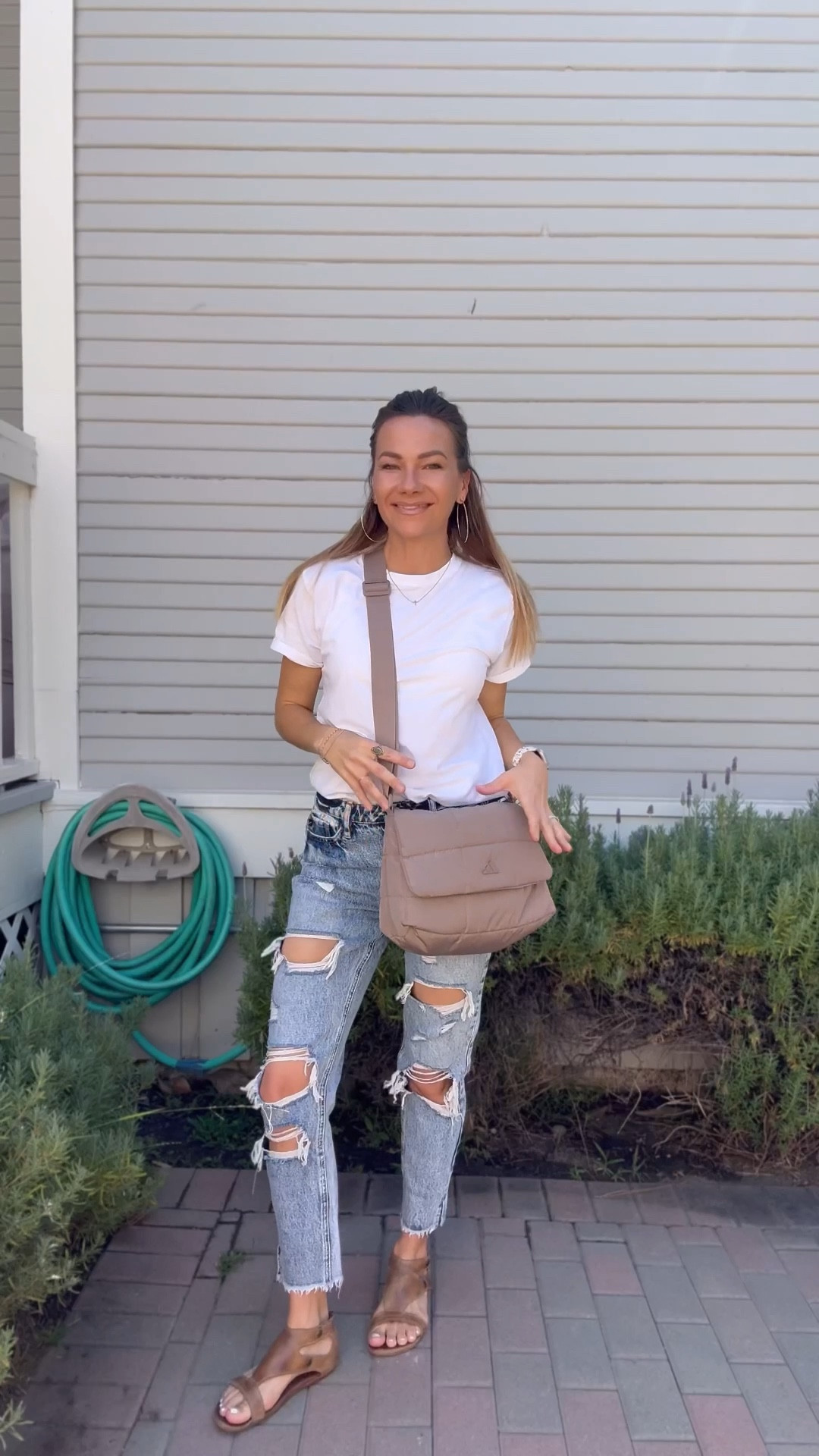 Love this Saturday outfit. Their holes in these jeans are fun and keep it casual. An oversized comfortable white t shirt can never be wrong. Also this crossbody bag is lightweight and a fun pop of color  

#LTKShoeCrush #LTKSeasonal #LTKItBag