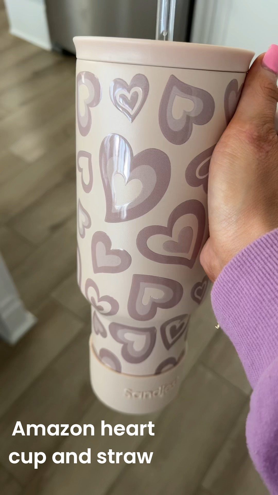 Obsessed with my new heart cup! 40 ounces and great quality. I had to grab these adorable heart shaped reusable straws to go with it. 😁💗

Amazon find. Hearts. Cup with handle. 