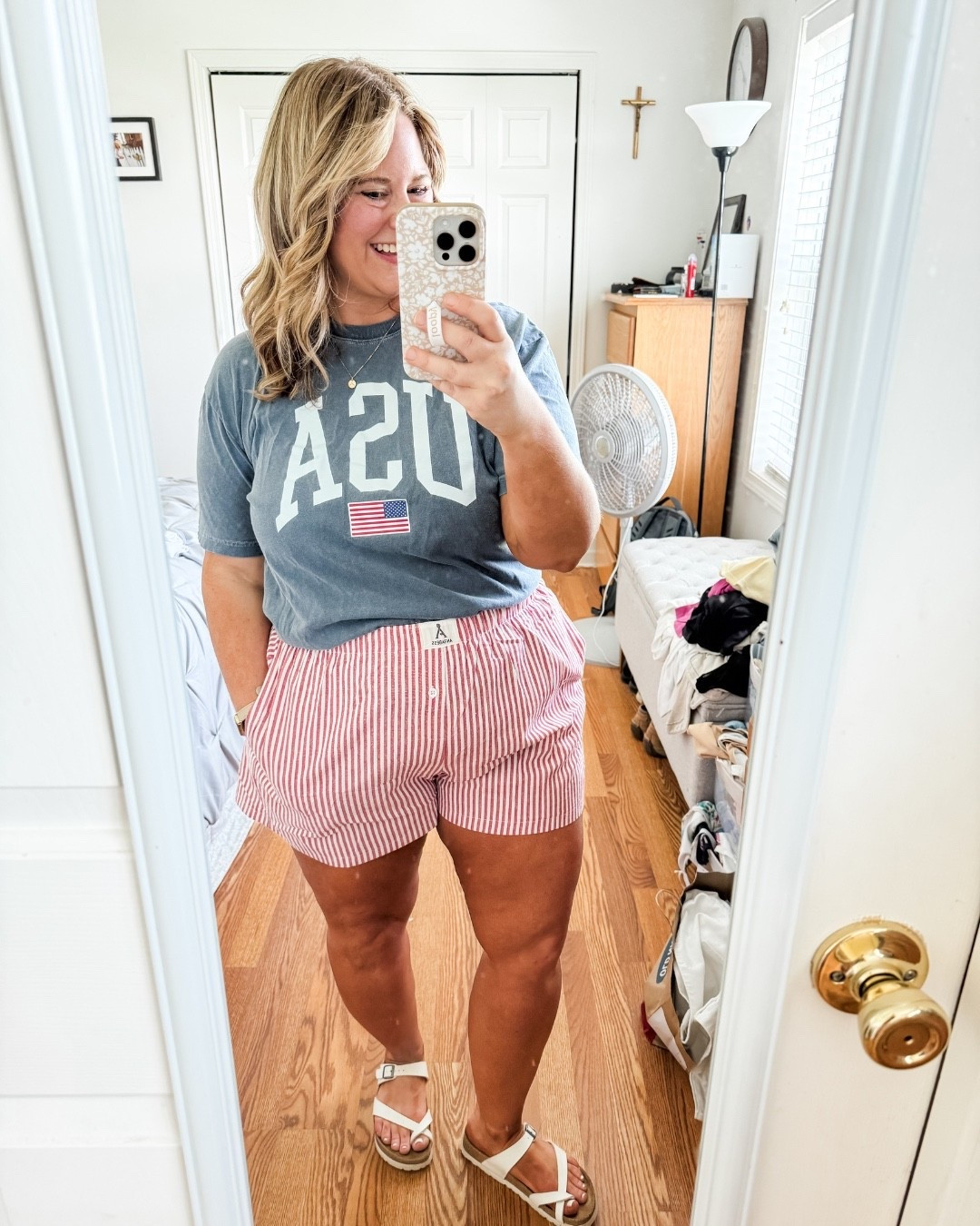 A graphic tee & striped shorts - perfect casual outfit for the 4th.  Wearing an xl in my shorts.  

#LTKMidsize #LTKFindsUnder50 #LTKSeasonal