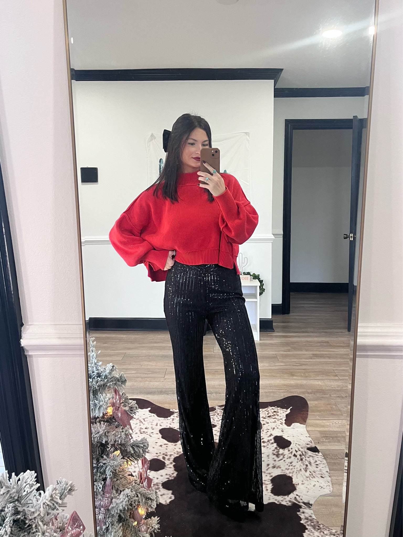 Sparkly holiday outfit! Black sequin flares paired with cropped red sweater! LORI20 to save at Willow! Size down in pants, they run larger in the waist 



#LTKSeasonal #LTKstyletip #LTKHoliday