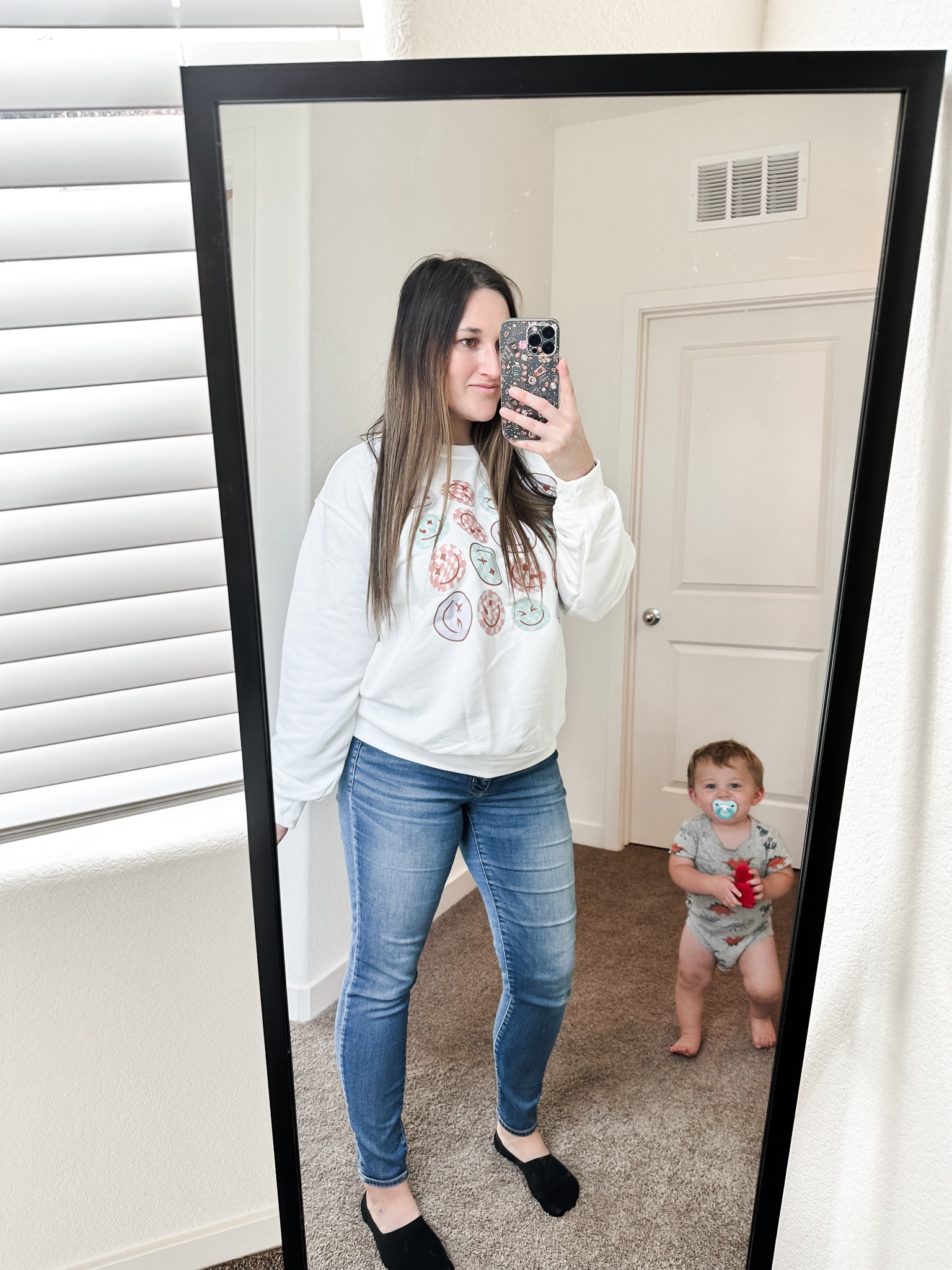 Retro smiley face sweater! So comfy and easy to pair with any jeans or leggings. 

#LTKstyletip #LTKU #LTKHoliday
