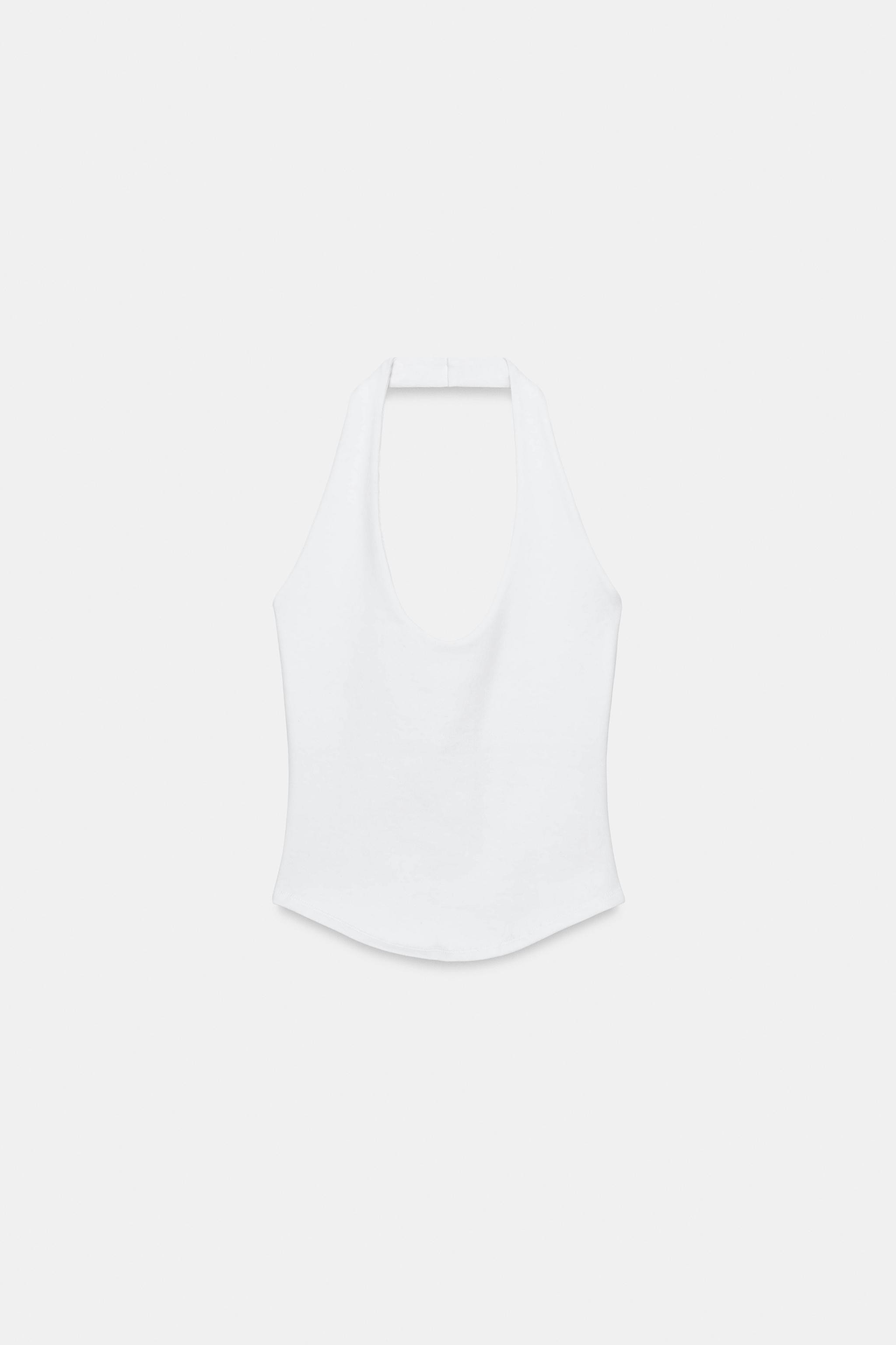 Gr\u00f6\u00dfe des Models: 178 cmTop aus Baumwollmischgarn. Neckholder und Rundhalsausschnitt. A... | Zara DE