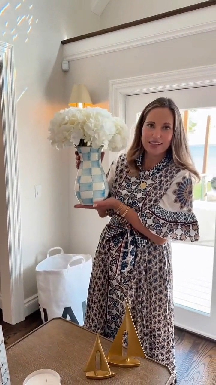 The Mackenzie-Childs Sky Check collection adds such a beautiful touch to my lake home. I love the soft blue tones and classic pattern throughout the space, especially for summer entertaining and lake weekends. These pieces make everyday hosting feel a little more special.

#LTKSeasonal #LTKOver40 #LTKHome