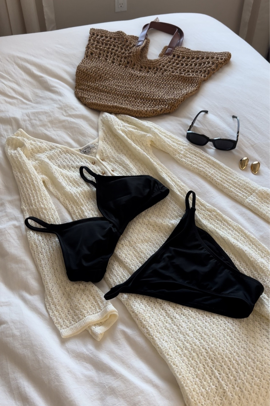 pool or beach day outfit: crème crochet maxi cover up, black swimsuit, beach bag, gold earrings, black sunglasses

#LTKSwim #LTKTravel
