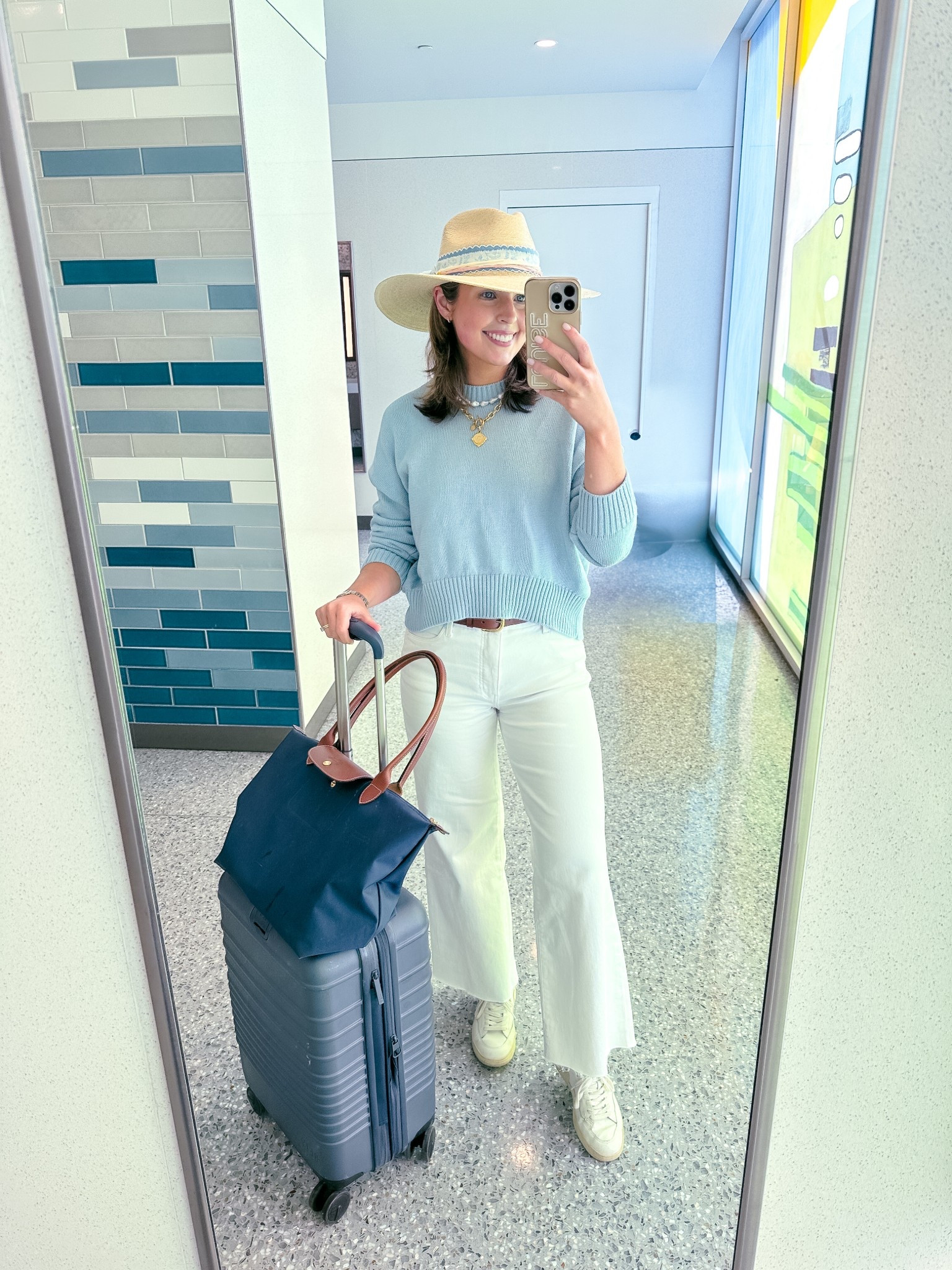 Travel ootd today! Wearing an XS in sweater and 2 in jeans. Hat is from Oxford Hat Bar!