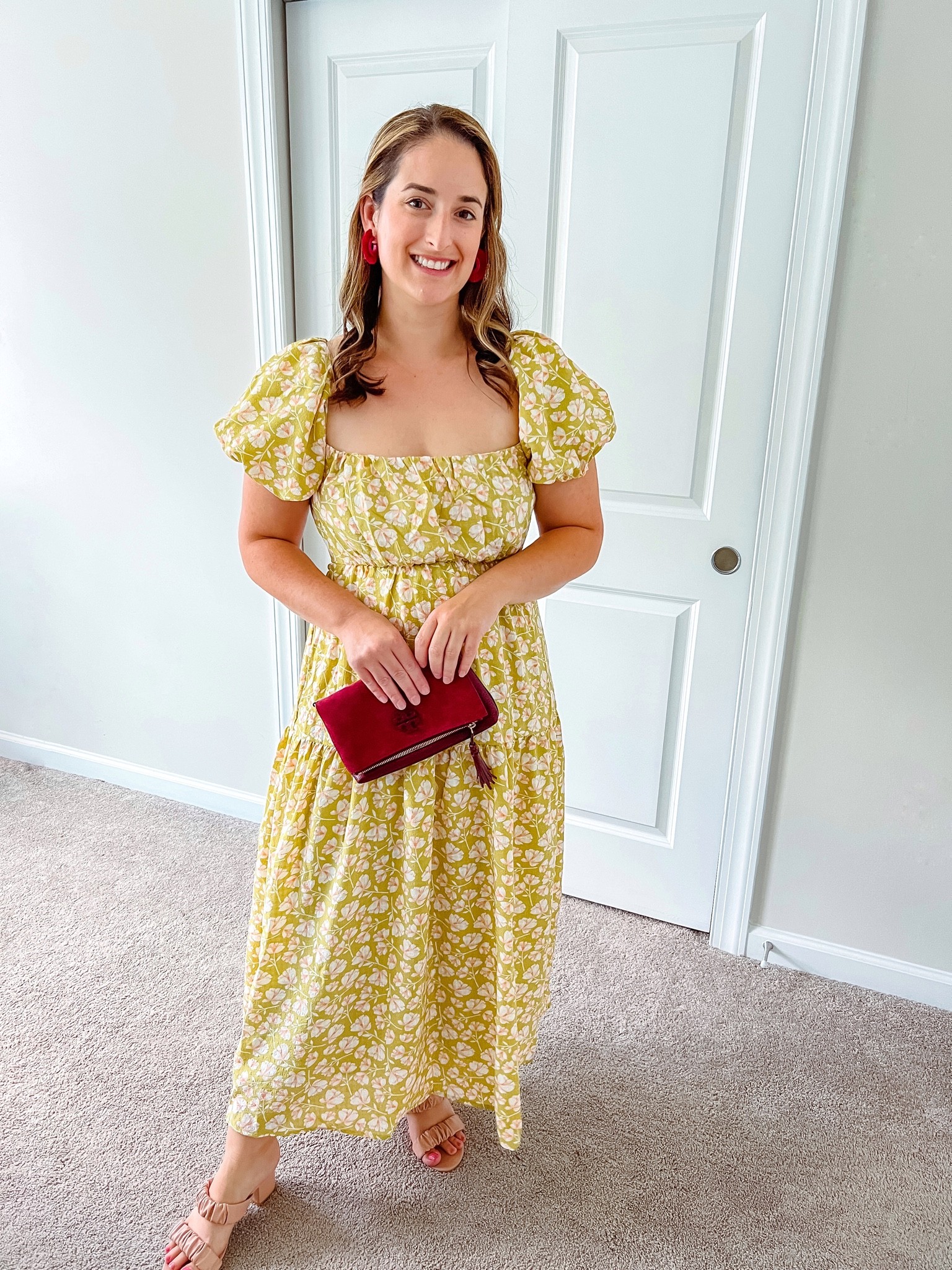This open back olive green and floral peach pink puff sleeve dress is the perfect pick for a fall wedding! I’m wearing it next week to one! I paired it with some fan fringe hoops, Nude pink sandals, and a maroon clutch bag  I’m wearing a size medium. Comes in a blue too! 

#LTKstyletip #LTKsalealert #LTKwedding