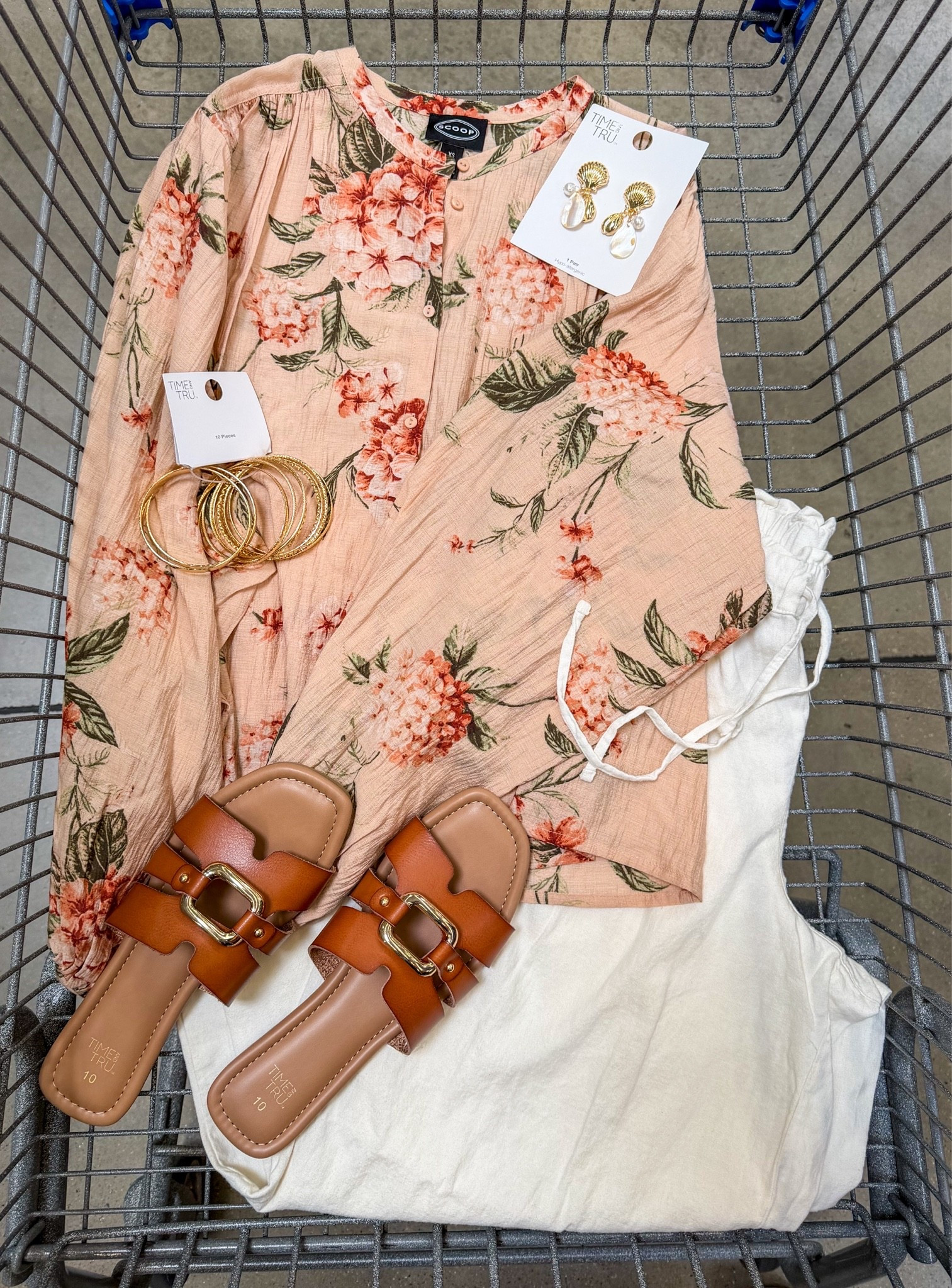 Feminine without trying too hard. 🌺🐚 This floral blouse paired with crisp white bottoms and warm tan sandals is one of those outfits that always looks polished, no matter where the day takes you.

#LTKootd #LTKgrwm #LTKSeasonal