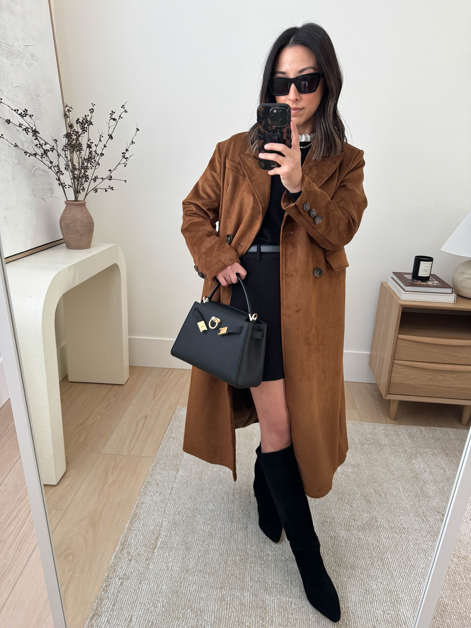 Anthropologie suede trench.This is a great suede option. Runs big, size down.  Lined and overall fit is amazing.  J.Crew tall boots- Mine are from last year and this year's version is taller, but still a great option for petites. 

Anthropologie trench petite xxs
Sezane sweater small
Theory skirt 0 (old)
J.Crew boots 5.5
Edited Pieces belt
YSL Sunglasses
Parisa Wang bag


#LTKSeasonal #LTKSaleAlert