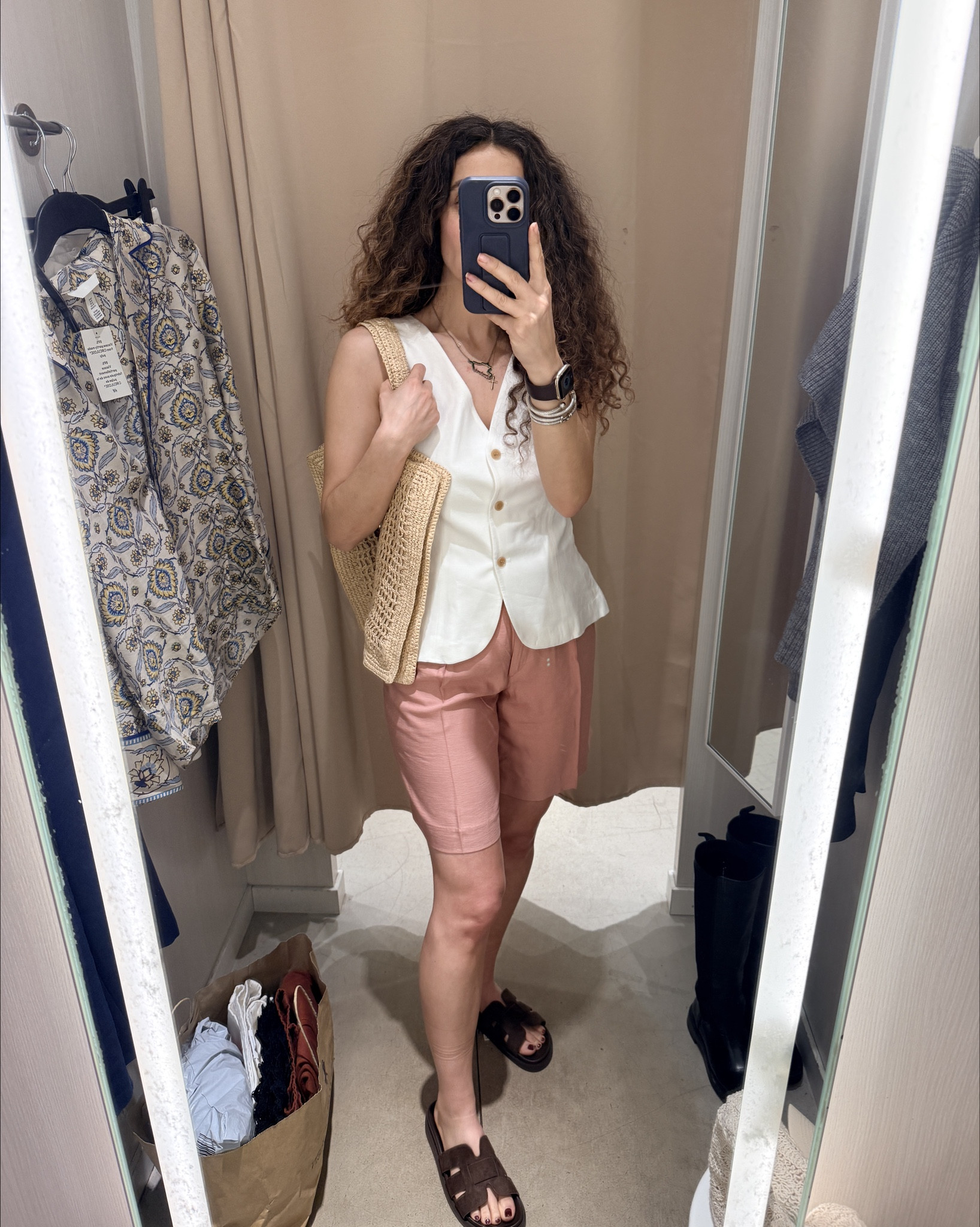 Spring break shopping. Linen shorts in size 4. Fits nicely. Linen vest in size small. Straw bag for the beach or the pool and brown slides. 

#LTKTravel #LTKootd #LTKSwim