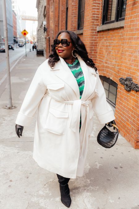 Nothing like a winter white coat to make a stylish statement. I love that this coat has cargo pockets too. And get into these accessories. They really elevate the look 

#LTKmidsize #LTKstyletip #LTKplussize