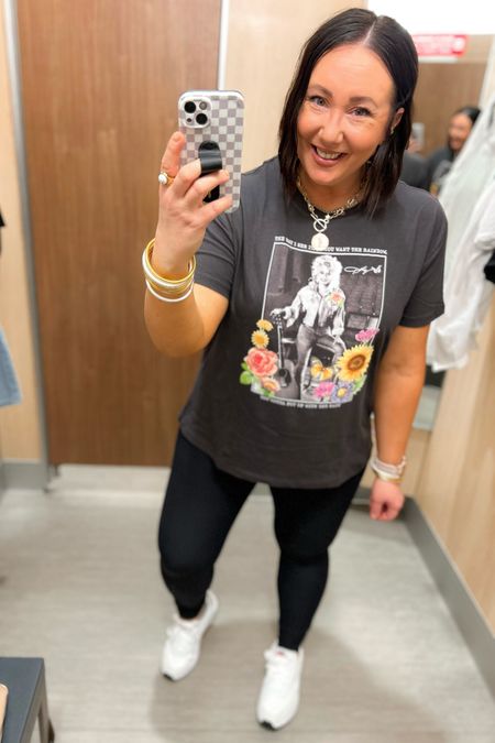 30% off tees at Target!  Love this new Dolly Parton graphic tee!  Sized up to an xxl, as this one runs small on me. Love the colors on this one. XL leggings. Sized up half a size in the Nikes  

#LTKfindsunder50 #LTKsalealert #LTKmidsize