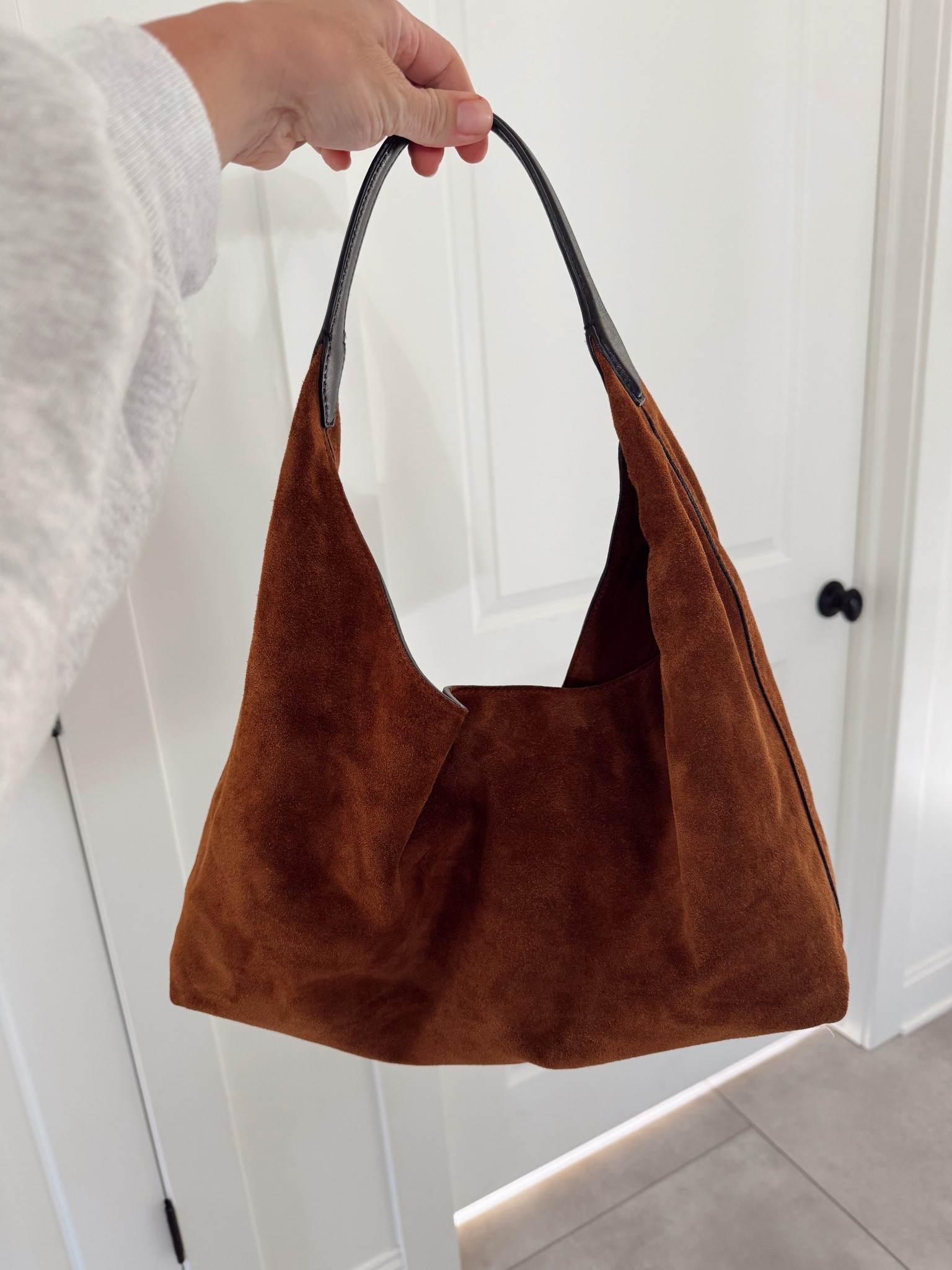 Madewell suede bag 25% off love the leather handle and the suede is gorgeous 

#LTKGiftGuide #LTKItBag #LTKSaleAlert