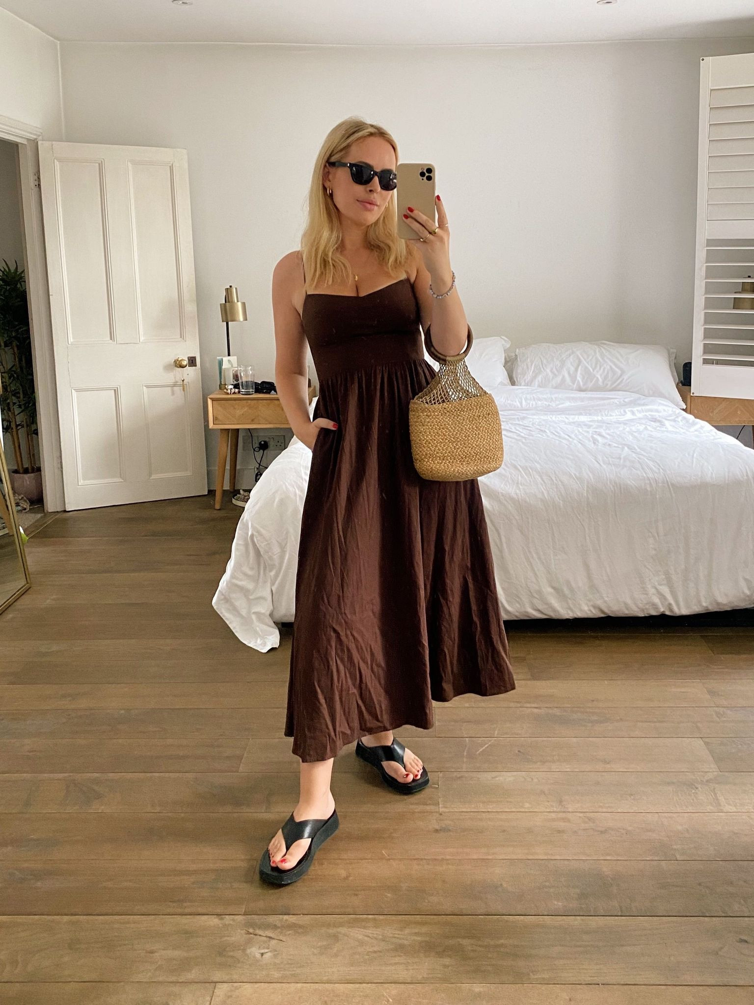 Brown dress, volume dress, strappy dress, summer dress, platform flip flops, black flip flops, black sandals, leather flip flops, macrame bag, bamboo holder, black sunglasses, cat eye sunglasses, Schuh, The Hut, Matteau, Free People, Cos, & Other Stories, Rixo, Sezane

#LTKstyletip #LTKeurope #LTKSeasonal