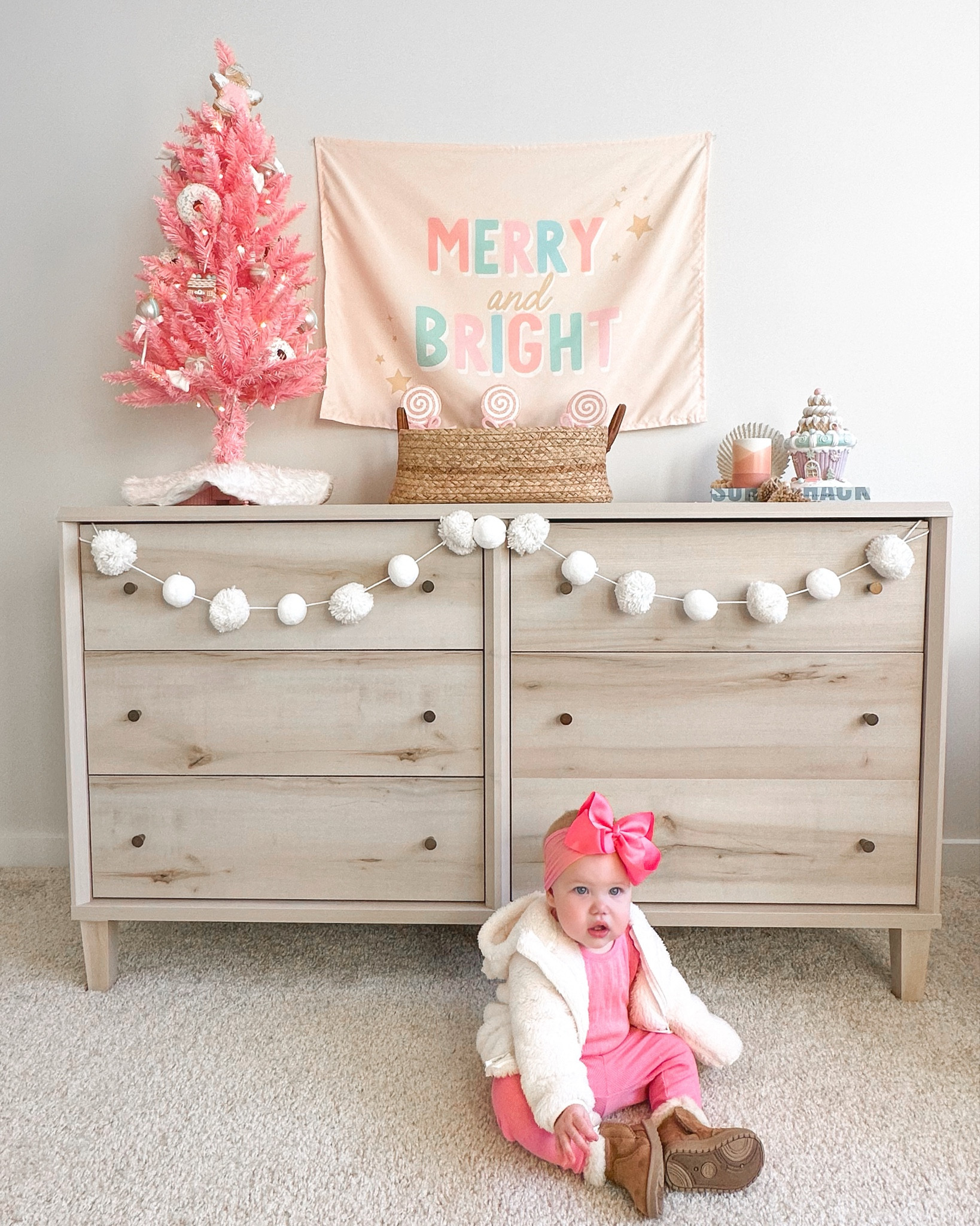 Baby girl nursery Christmas decor
Kids holiday decor
Pink Christmas tree
Pom pom garland 
Christmas banner 

#LTKbaby #LTKHoliday #LTKSeasonal
