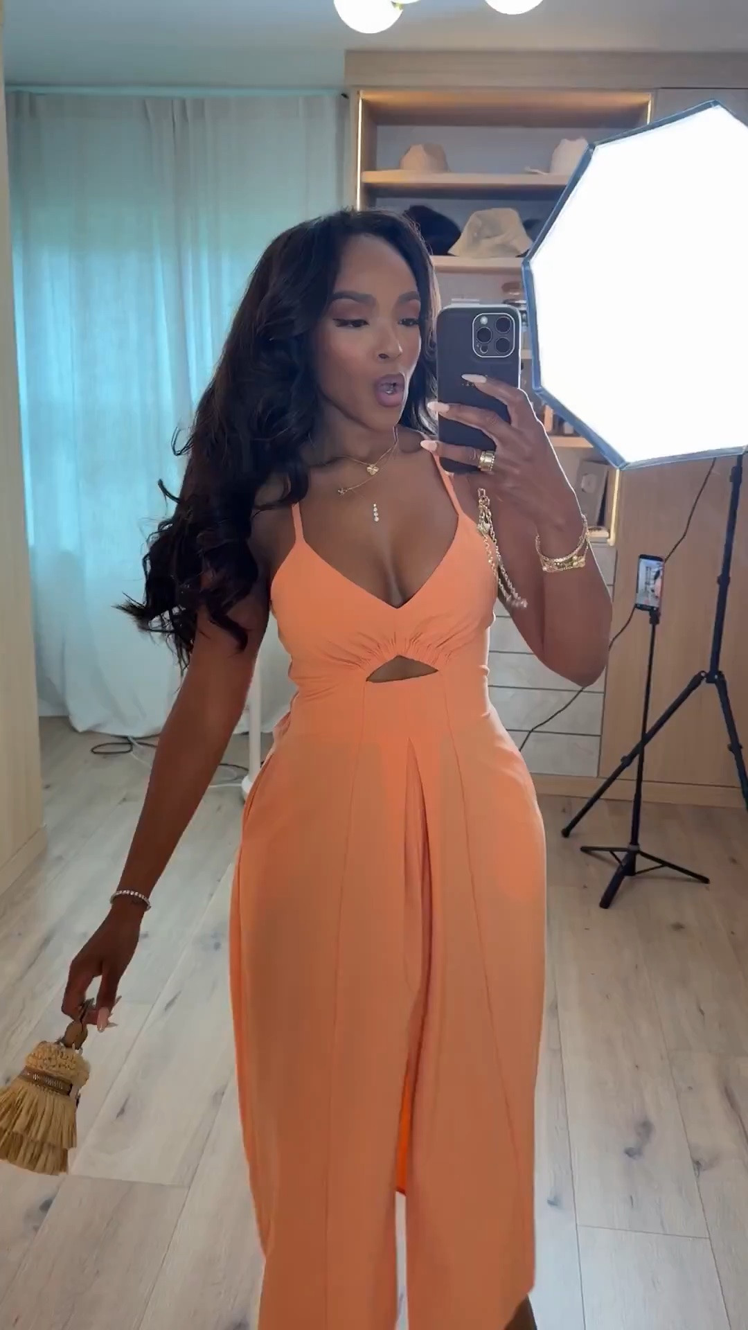 Hi Babes! 

This peachy coral midi is giving effortless vacation glam 🍑 The flowy silhouette, subtle cutout detail, and soft movement make this one of those dresses that instantly looks elevated with almost no styling needed. I love how the color pops against bronzed skin and gold accessories for that luxe summer feel.

This is the kind of dress you pack for every trip because it works for so many moments — lightweight, flattering, and easy to dress up with heels or keep relaxed with flat sandals.

Perfect for:
• Beach vacations  
• Resort dinners  
• Summer date nights  
• Cruise outfits  
• Tropical vacations  
• Sunset dinners  

Everything is linked below ✨

xx Kira | IG: KirasFashionFinds

34D - 27 - 40 • Size Small or 4