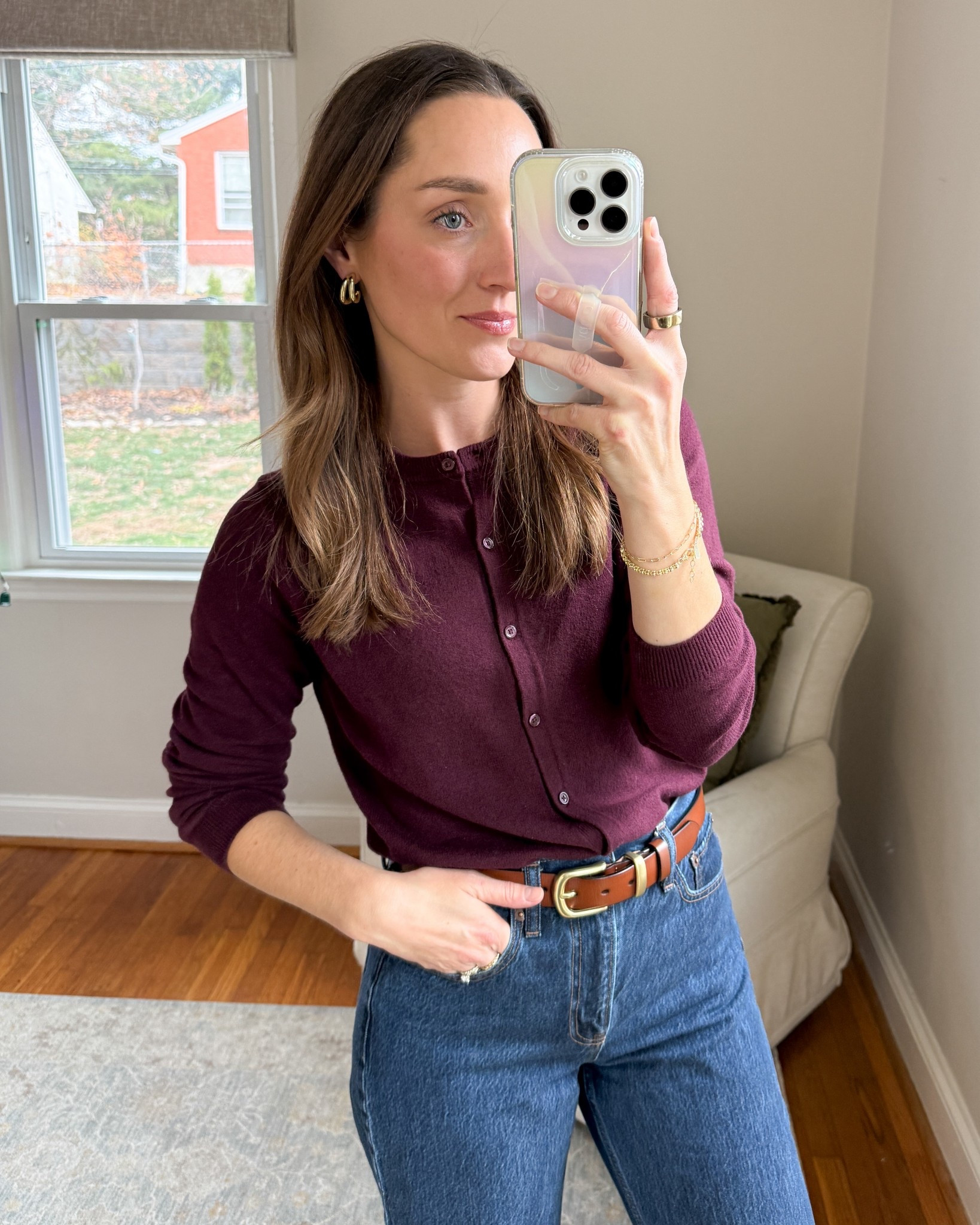 This gap cardigan is on sale for $27 today! It is still available in most sizes. I love the dark purple burgundy color. Wearing a size small.
