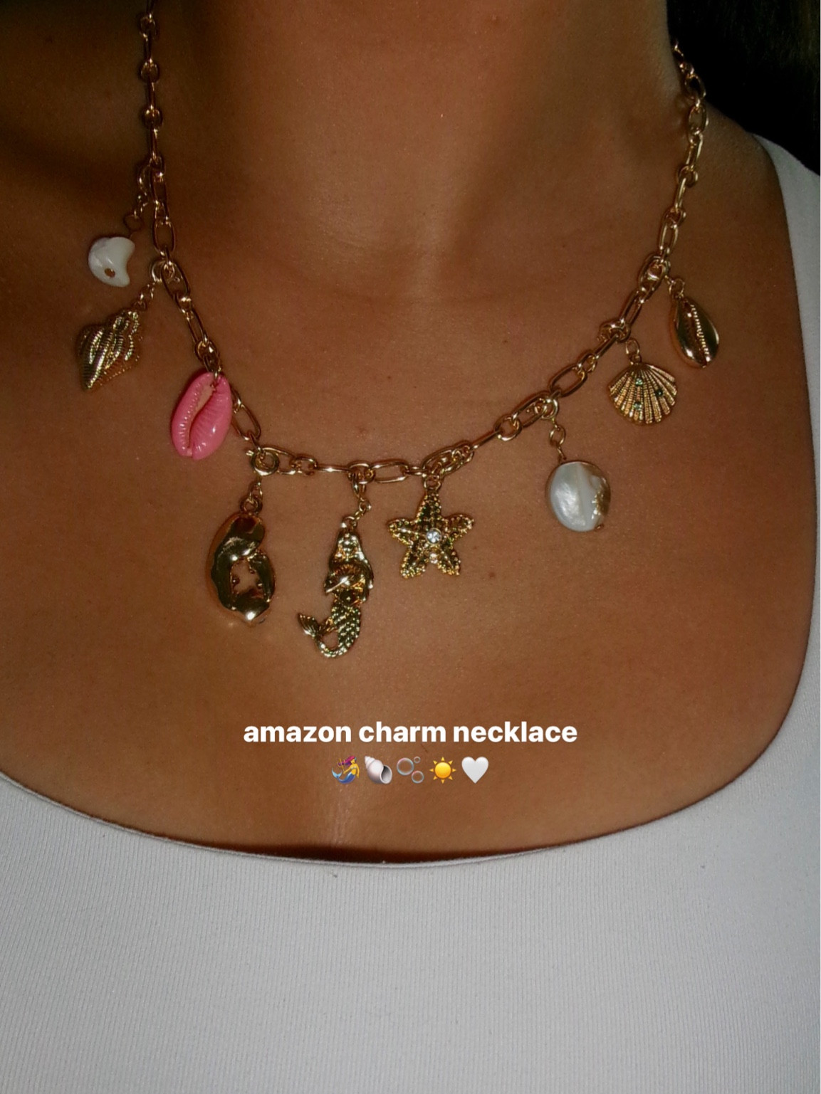 jumped on the trend— love this summer accessory! such an adorable beachy necklace #summeraccessory #charmnecklace #amazonfinds #amazonjewelry 