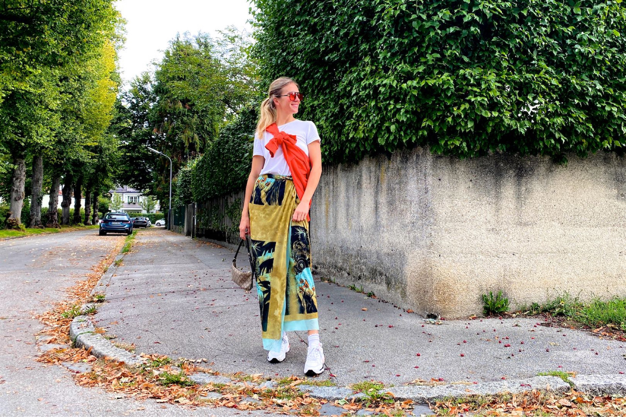 Mesh Skirt. Fashion Blogger Girl by Style Blog Heartfelt Hunt. Girl with blond ponytail wearing a mesh skirt, white T-shirt, orange hoodie, orange sunglasses, vintage Gucci bag, orange socks and dad sneakers. #colorfuloutfit #colorfulstyle #colorfulfashion#colorfullooks  #fashionfun #cutesummeroutfit #summerfashion2022 #summerlookbook #fitcheck #dailylooks #dailylookbook