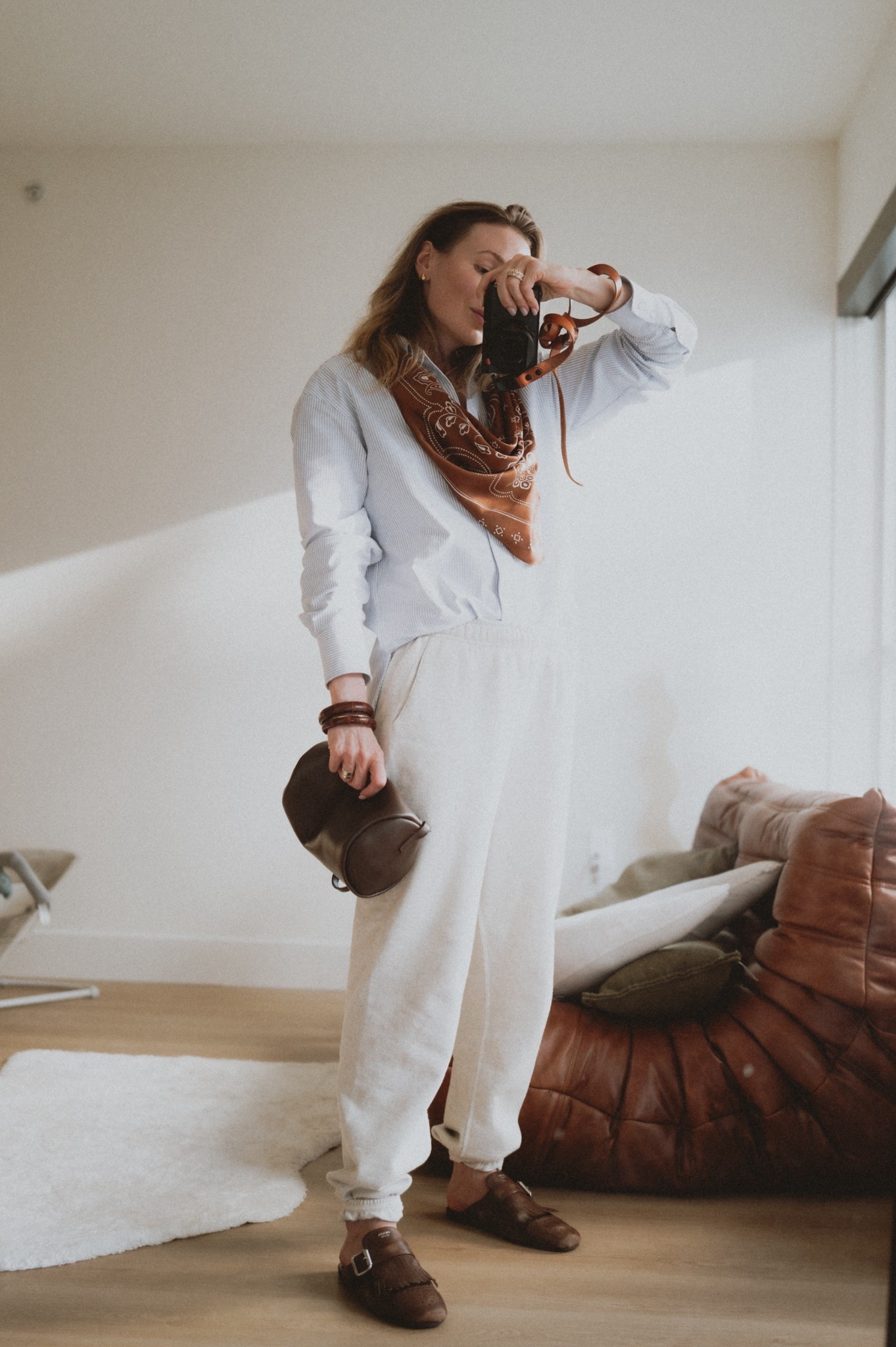 OOtD: my fave of late - Golden Goose boyfriend shirt + Buck Mason sweatpants + Prada mules + St. Agni connolo mini shoulder bag. Silk scarf by Madewell ☺️

#LTKSeasonal #LTKShoeCrush #LTKItBag