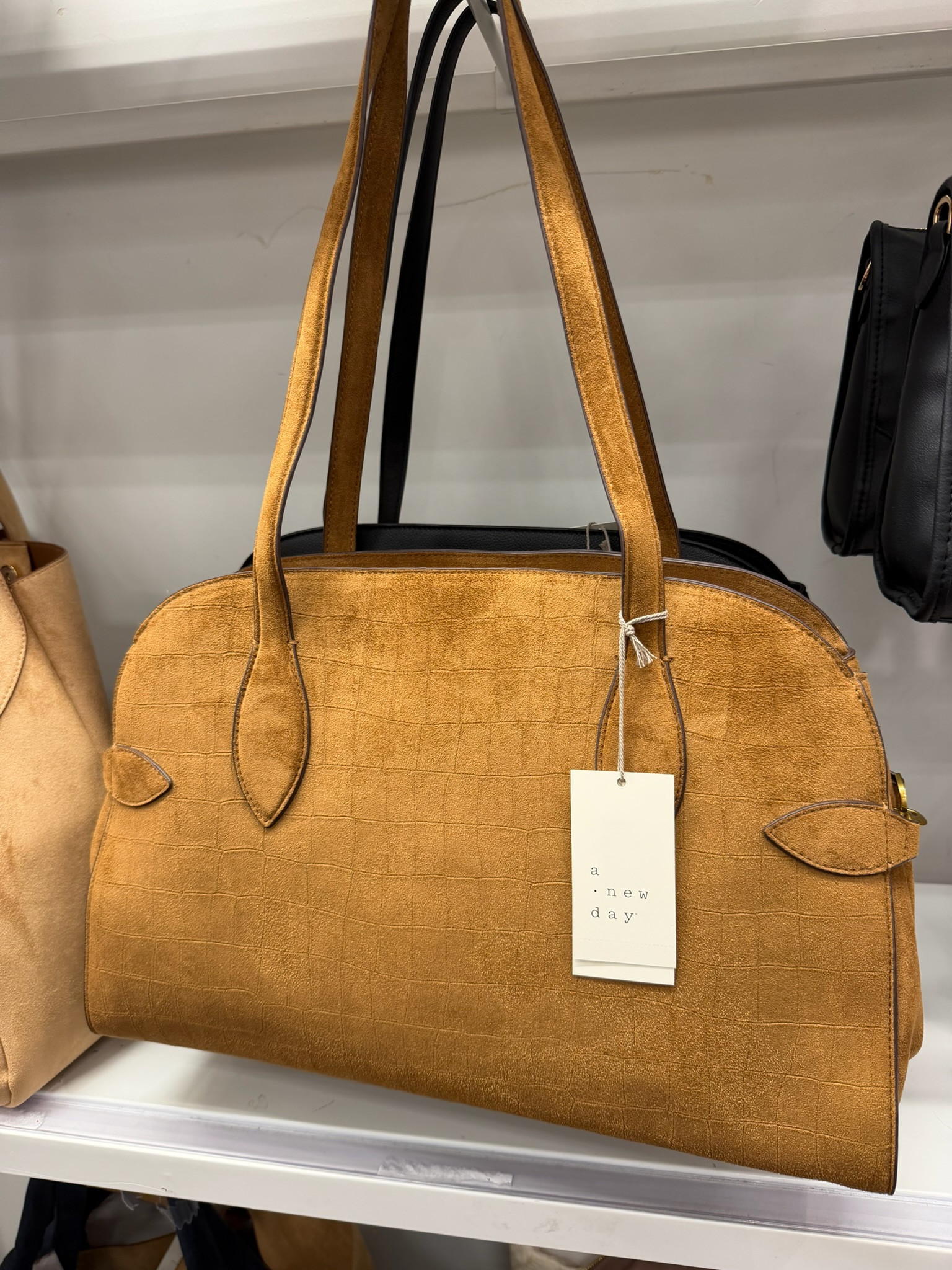 This new Target work bag looks so much more expensive than $30 🤎 The faux suede texture, structured shape, and roomy commuter design make it perfect for carrying your everyday essentials to work - and it’s currently 25% off. No wonder more than 700 were bought last month!

wedding guest dress summer, teacher outfits, country concert outfits, back to school outfits, date night outfits, vacation outfits beach, business casual workwear, summer outfits over 40, summer dresses, concert outfit ideas
 

 #LTKootd #LTKmomlife #LTKSeasonal