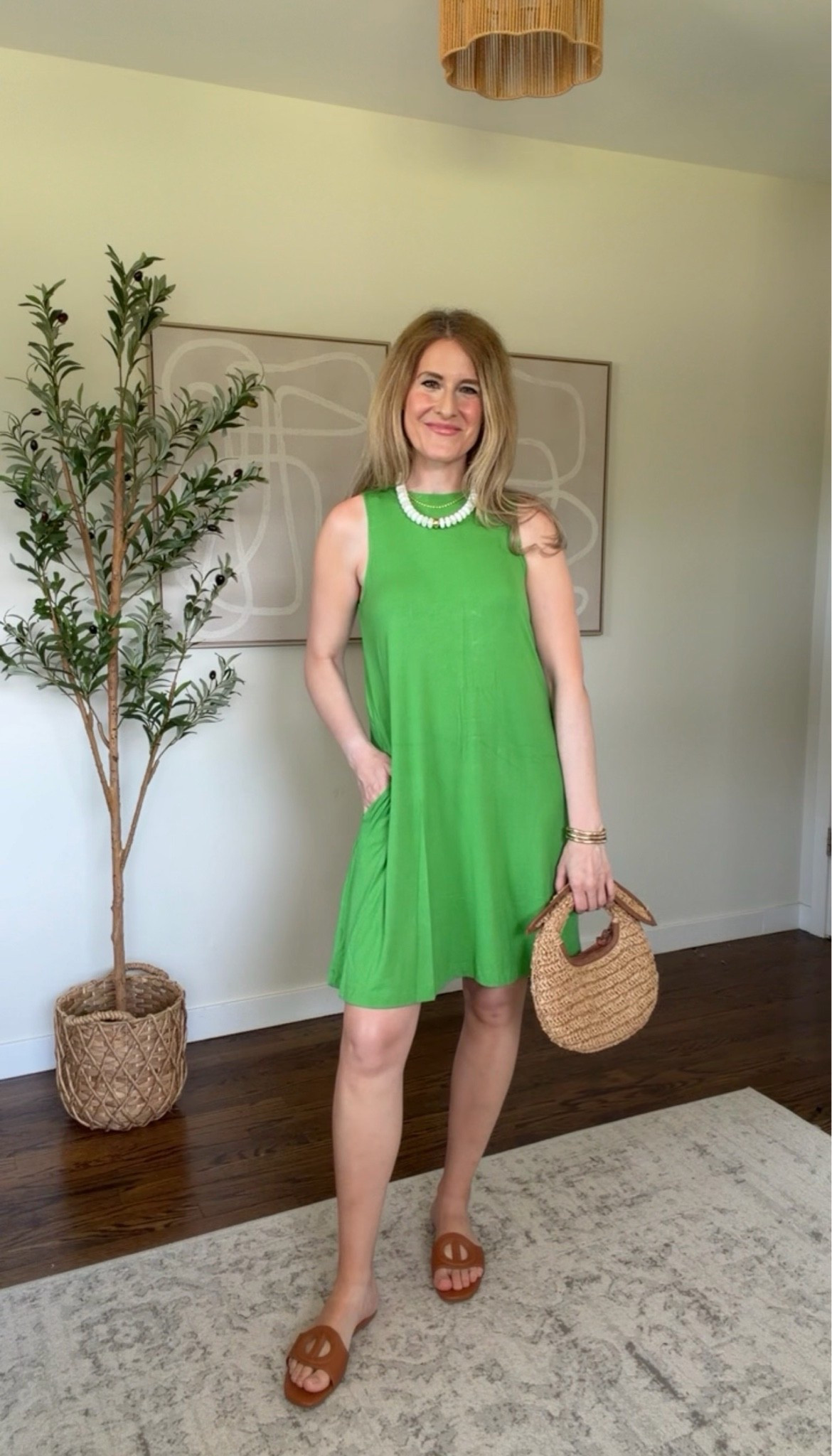 Spotted the $12.98 swing dress in this new green hue! I sized up to a medium. It’s clingy but comfy and great for travel. You could also throw it on over a bathing suit. #walmartfashion

#LTKOver40