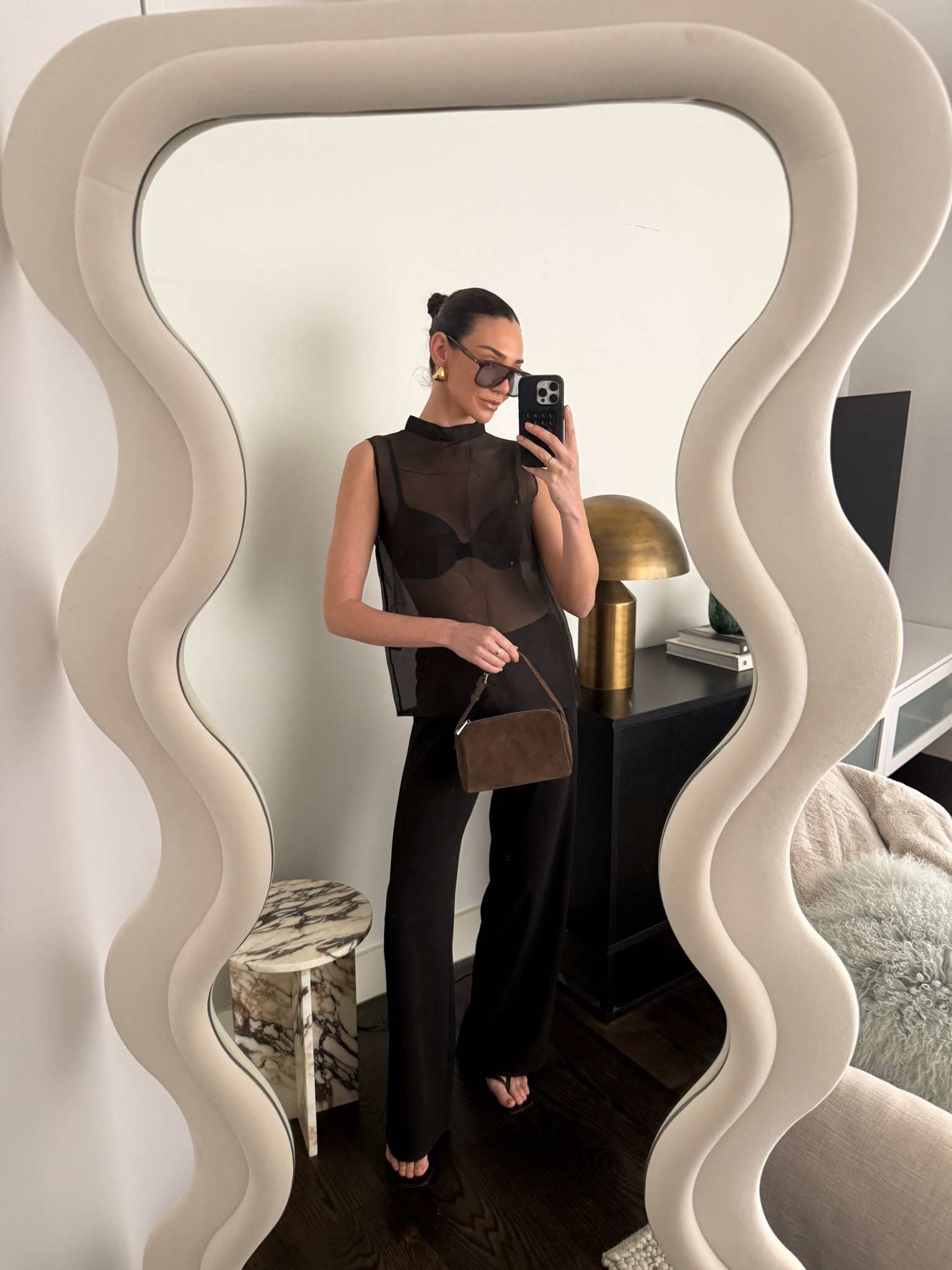 Black sheer top 
Black trousers 
Leather black sandals 
Oversized sunglasses 
Brown suede mini bag 

#LTKspring #LTKdatenight #LTKaustralia