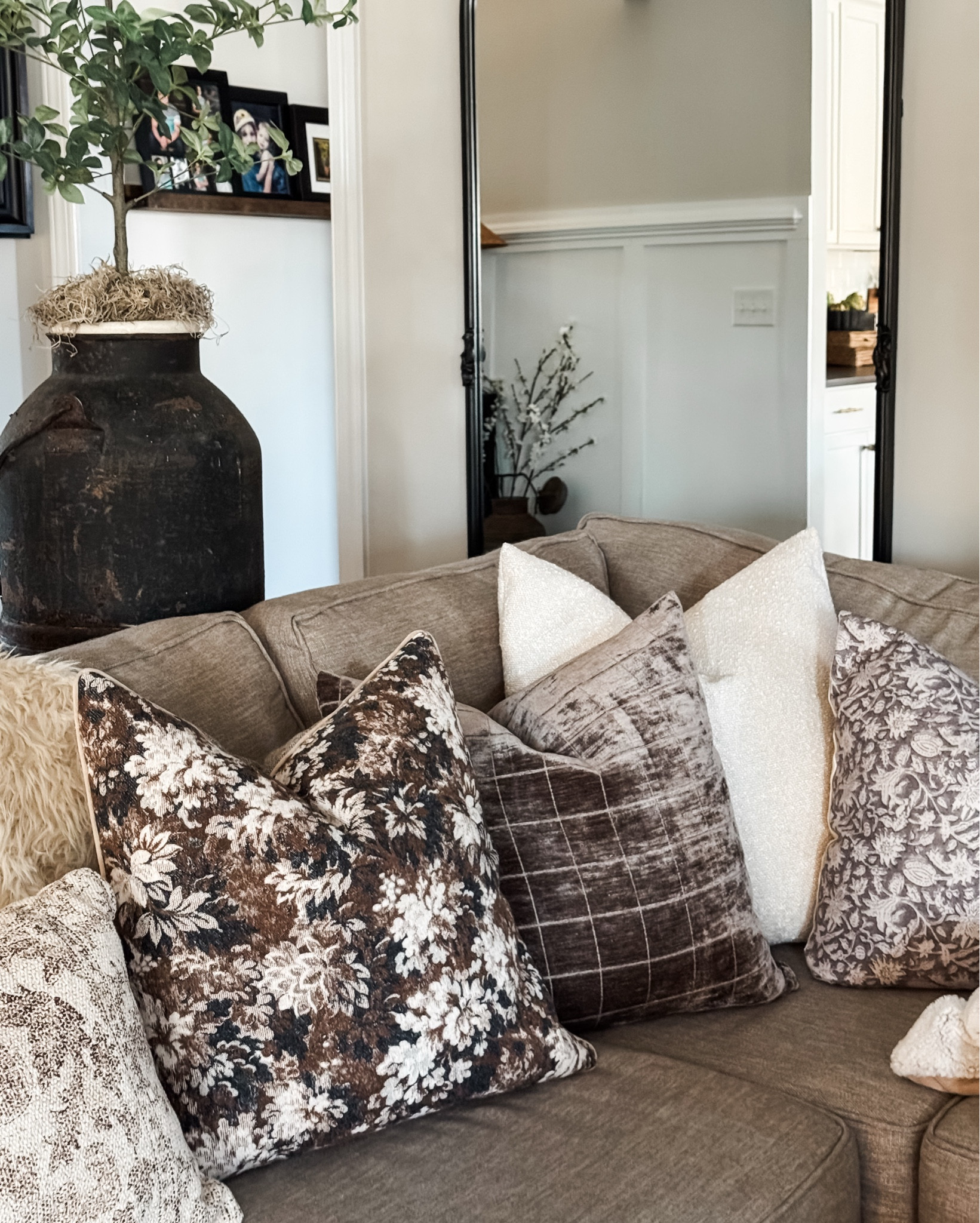 Home Lately

I love this warm cozy combo!! My beige boucle pillow is 22”x22”. The other pillows are 20”x20”. Always add 2” to your insert.
My woven storage boxes continue to be a best seller and are 1/4th the price of the designer ones!!

My coffee table is no longer available. I’ve linked 2 similar ones here.

Cozy throw pillows, pillow inserts, faux fur, console table, vintage inspired area rug, woven storage boxes, ottomans, Cabbage roses, greenery with tiny white flowers, vintage wood vase, floor lamp with woven shade, upholstered side chair, drink table, outdoor wicker furniture, outdoor lanterns, 
