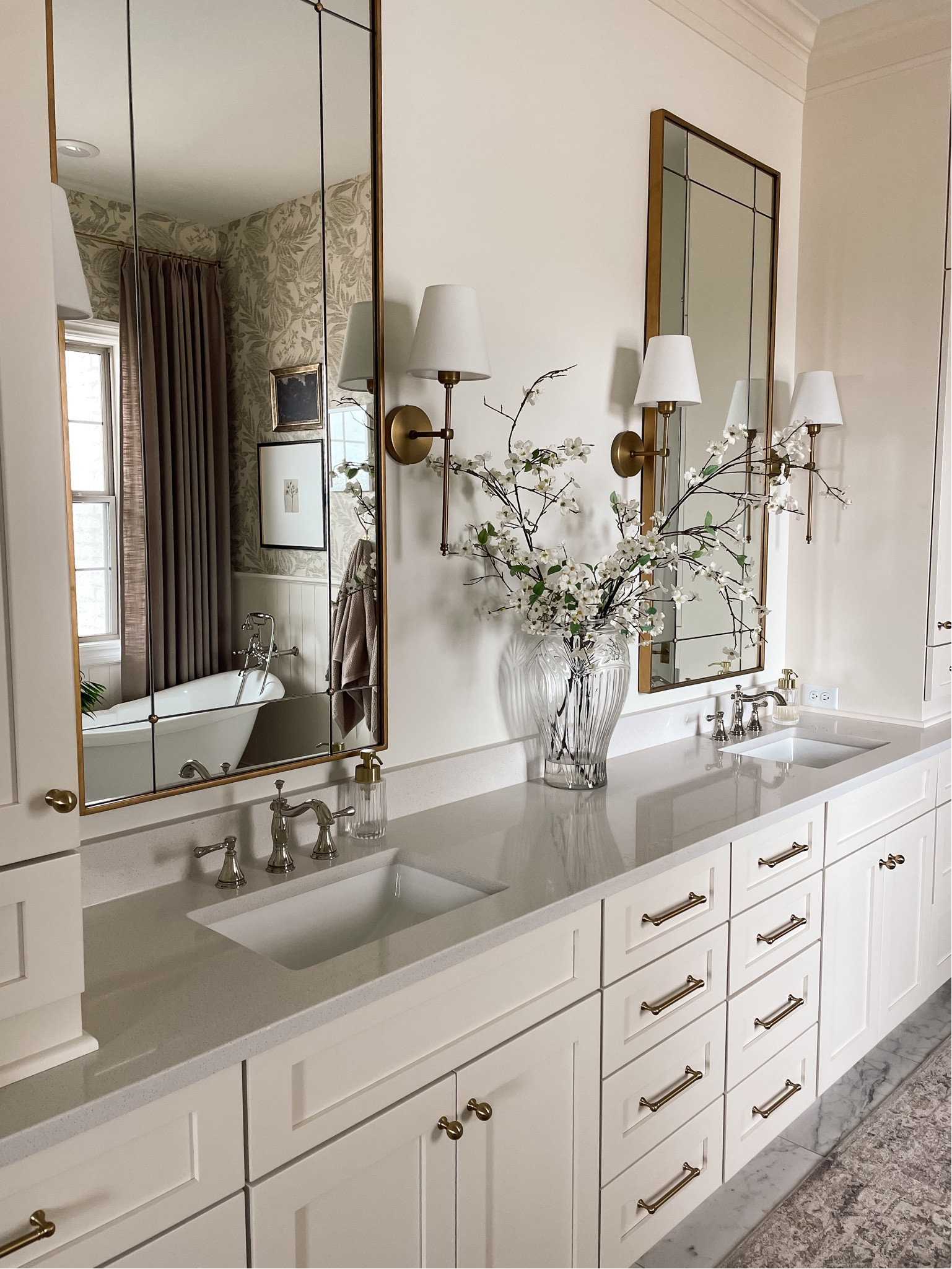 New favorite room in the house 😍 the mirrors have rub and buff Grecian gold on them. If you order keep that in mind! Linked everything I could. Vase is an antique find. Cabinet hardware top knobs  Kara honey bronze. Cabinet color creamy White BM 

#LTKSeasonal #LTKhome #LTKU
