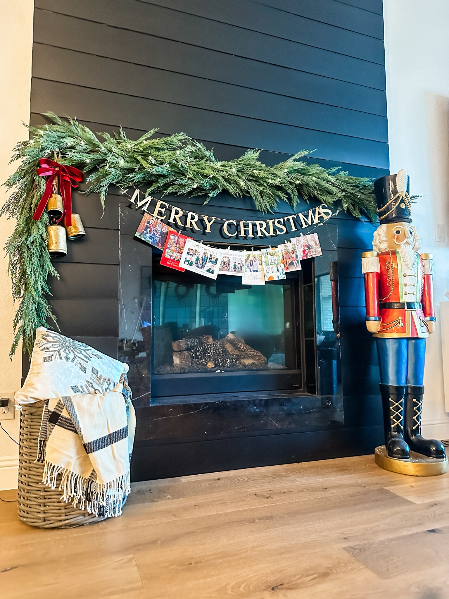 Christmas mantle. Fireplace decoration. No mantle decoration. Norfolk pine garland. Crate and barrel garland. Nutcracker. Merry Christmas sign. Photo display. Christmas card display. 

#LTKSeasonal #LTKhome #LTKHoliday