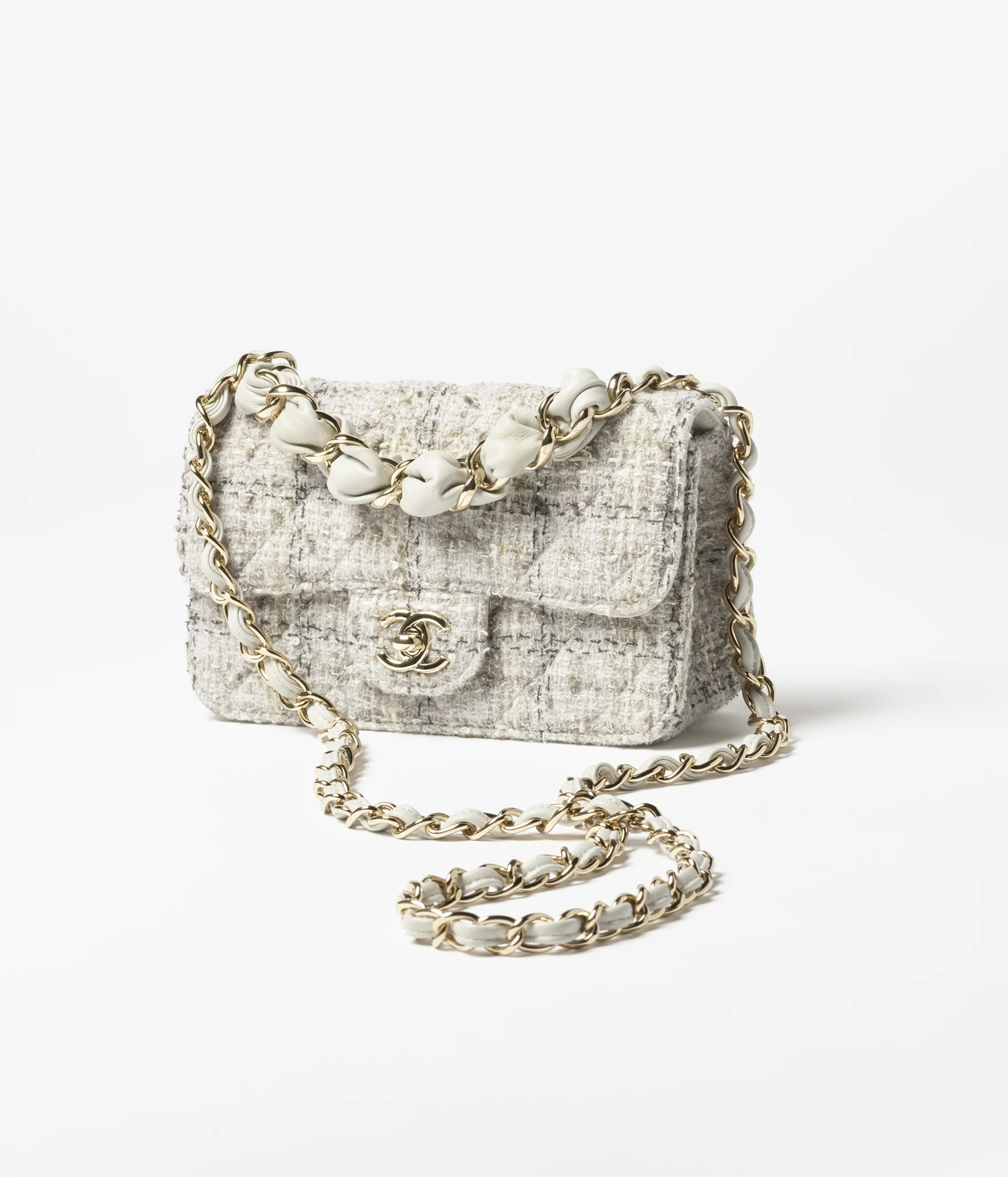Mini flap bag, Wool tweed & gold-tone metal, gray, black & gold — Fashion | CHANEL | Chanel, Inc. (US)
