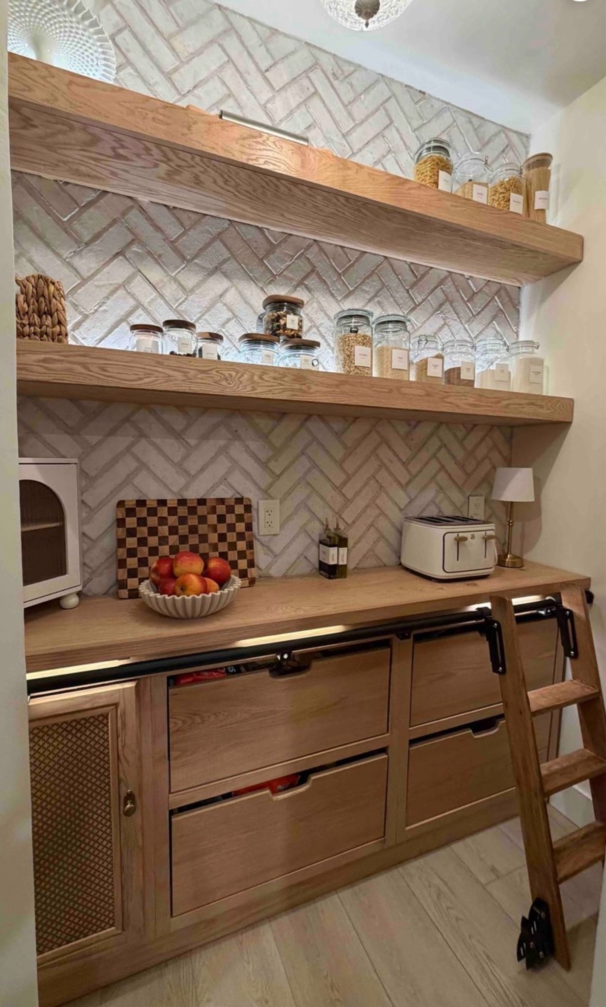 Turned our basic builder-grade corner pantry into a custom old-world inspired space with tons of storage, custom drawers, a stone arch, and of course… a rolling ladder 🤎

All my pantry links and sources are below 🙌

#LTKHome