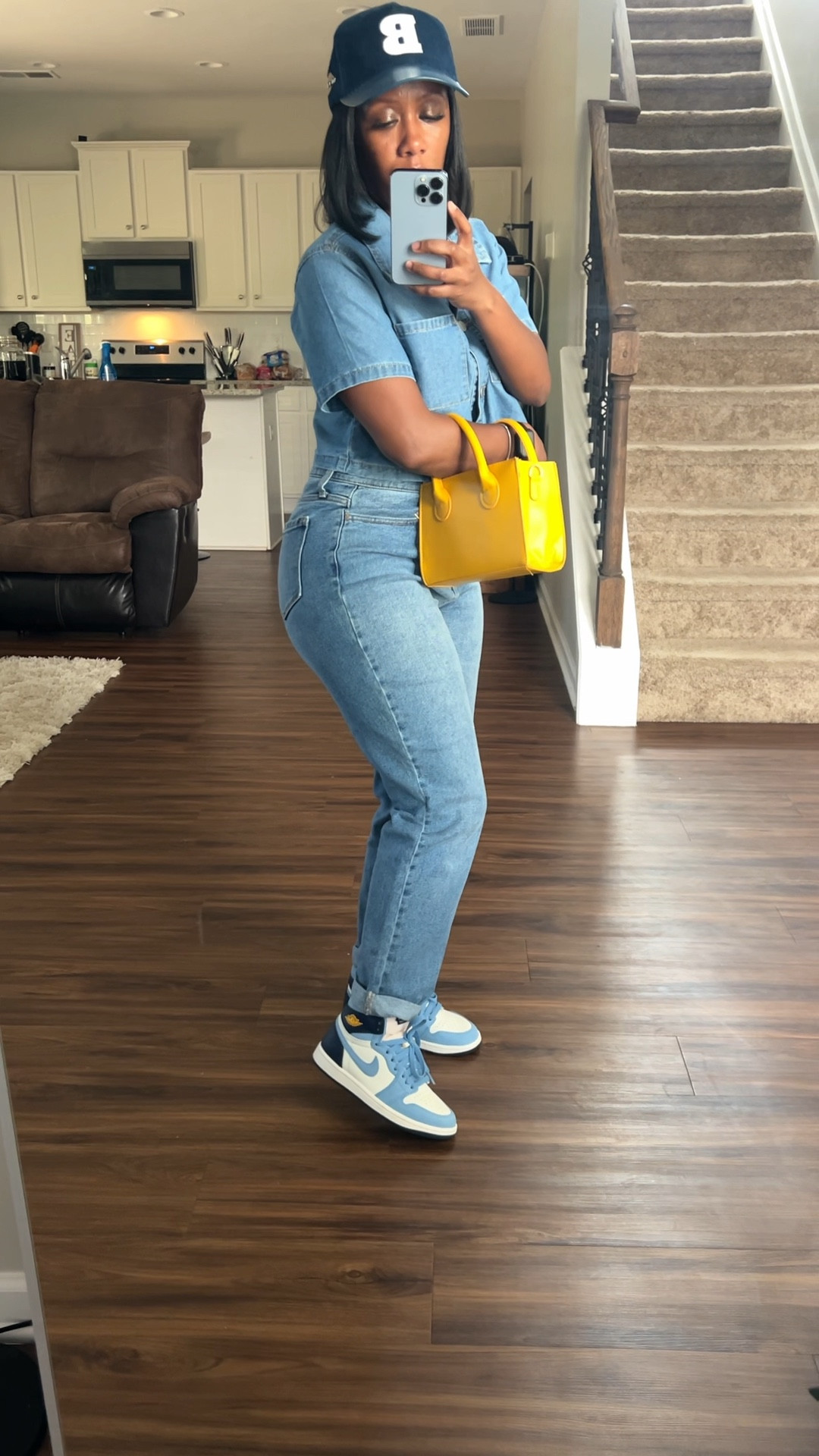Denim on denim outfit idea. I’m wearing a crop button up size small with high waisted jeans size 9. I styled this casual outfit with a navy corduroy hat, yellow purse, and Jordan 1 sneakers 

#LTKStyleTip #LTKFindsUnder100 #LTKPetite