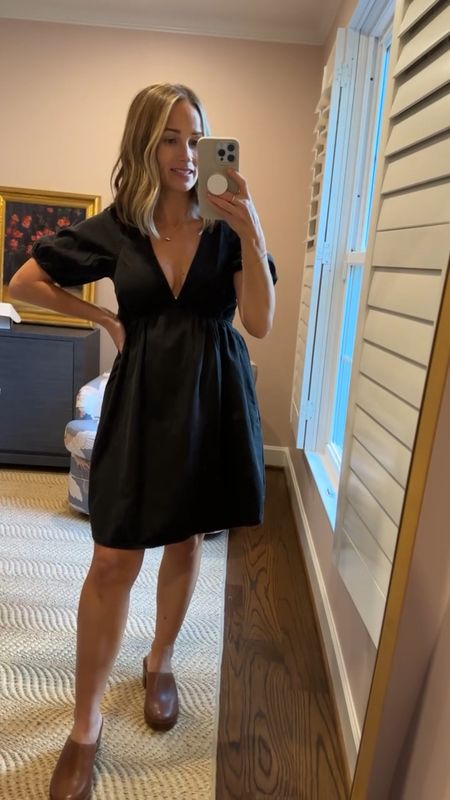 This black Madewell dress is SO cute. It would be great for a concert with boots, but it’s also perfect with these Madewell clogs. It’s bump friendly, and has a super cute button up situation in the back. #madewell

#LTKSeasonal #LTKshoecrush #LTKbump