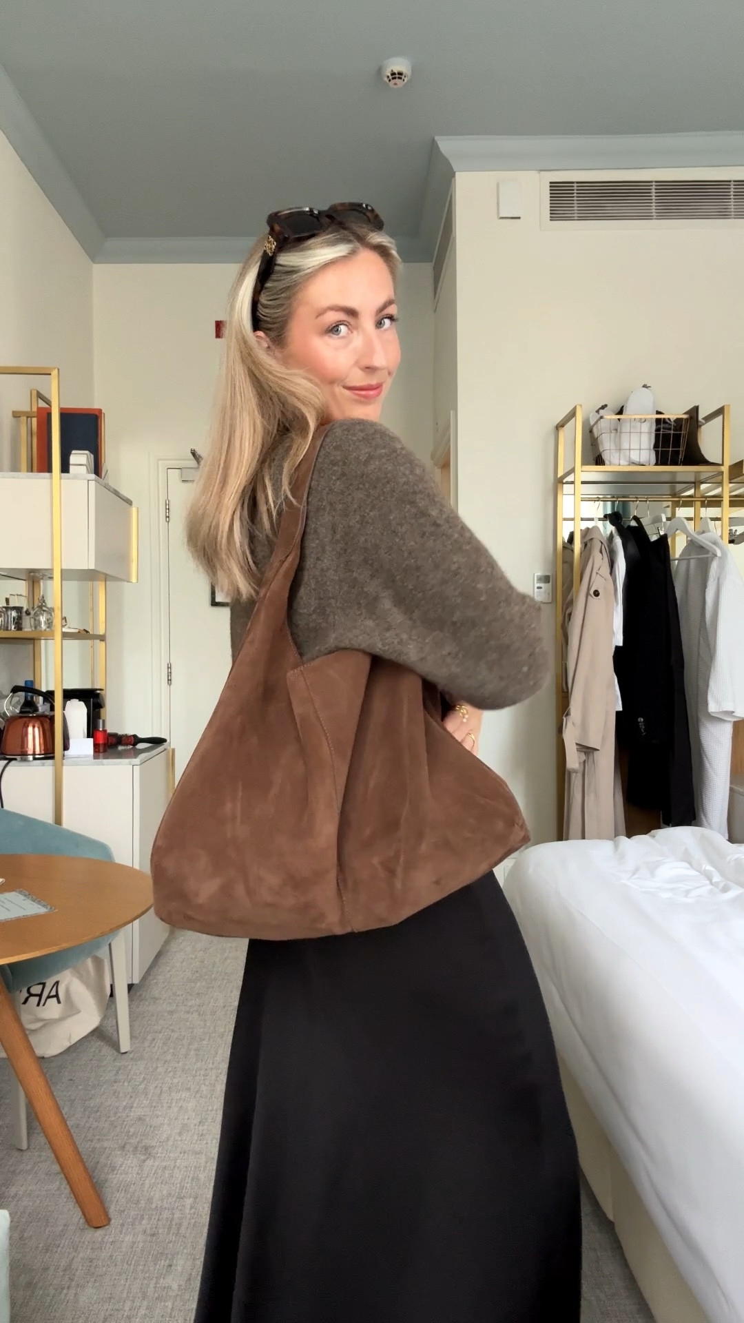 Chocolate brown for autumn 🫶🏻🤎 

Short sleeve knit, suede bag, lower sunglasses, satin skirt, autumn outfit 

#LTKstyletip #LTKbag #LTKautumn