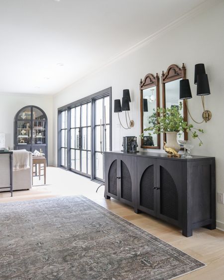 We filled this large empty corridor space with this Loloi rug that’s currently on sale, and I love how flat it lays! Perfect for areas with heavier foot traffic and pets! And my black sideboard is a favorite piece and also on sale for 20% off and free shipping!

#LTKsalealert #LTKhome #LTKstyletip