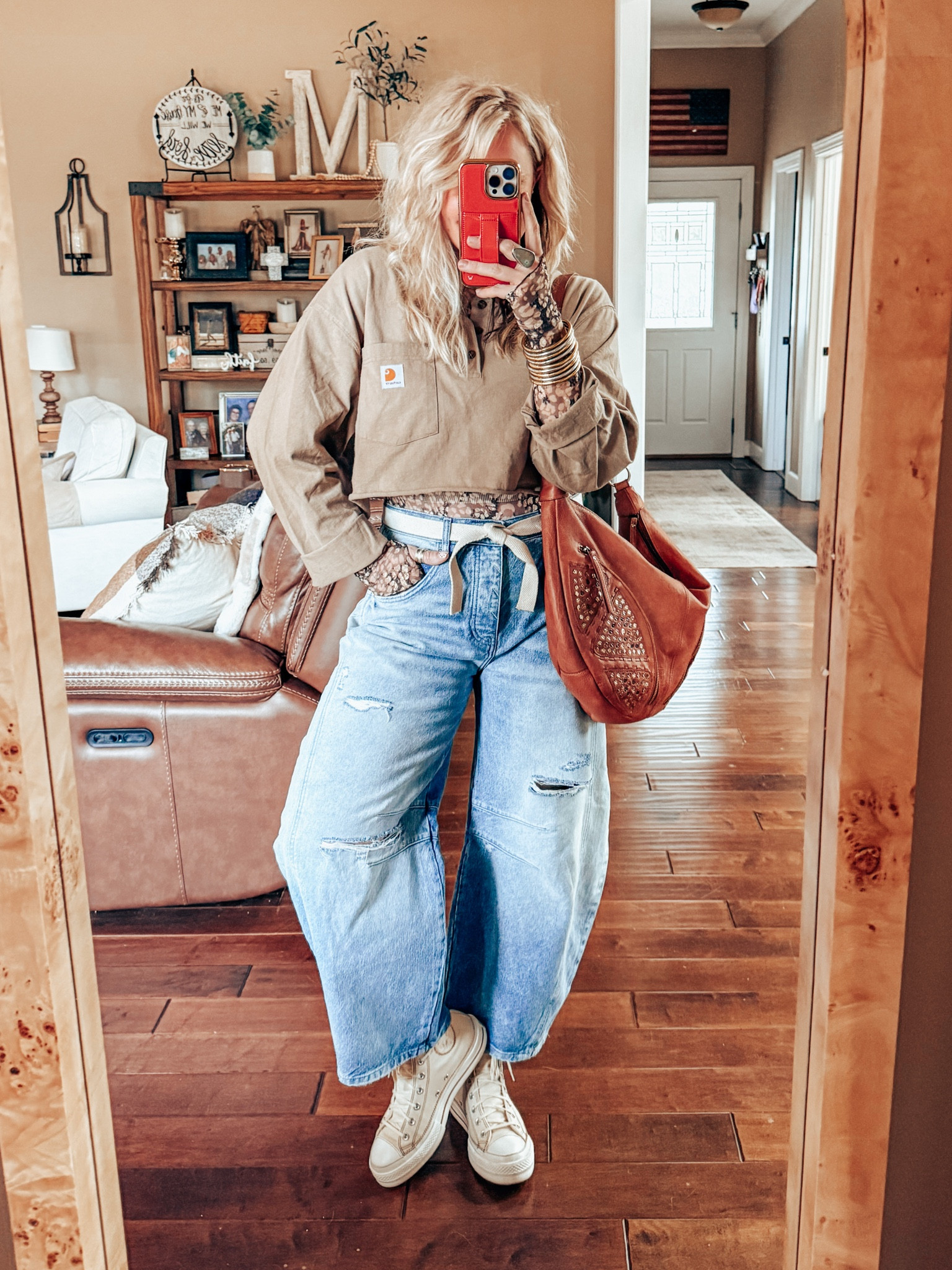 Fun way to style a mesh top! This mens carhartt was a little long in the sleeves so I decided to cut them off and roll them up. 
Carhartt - L
Mesh top - M
Jeans - sized down 
Sneaks - sized down 
EARRINGS - save with code MANDIE20 

#LTKStyleTip #LTKFindsUnder50 #LTKOver40