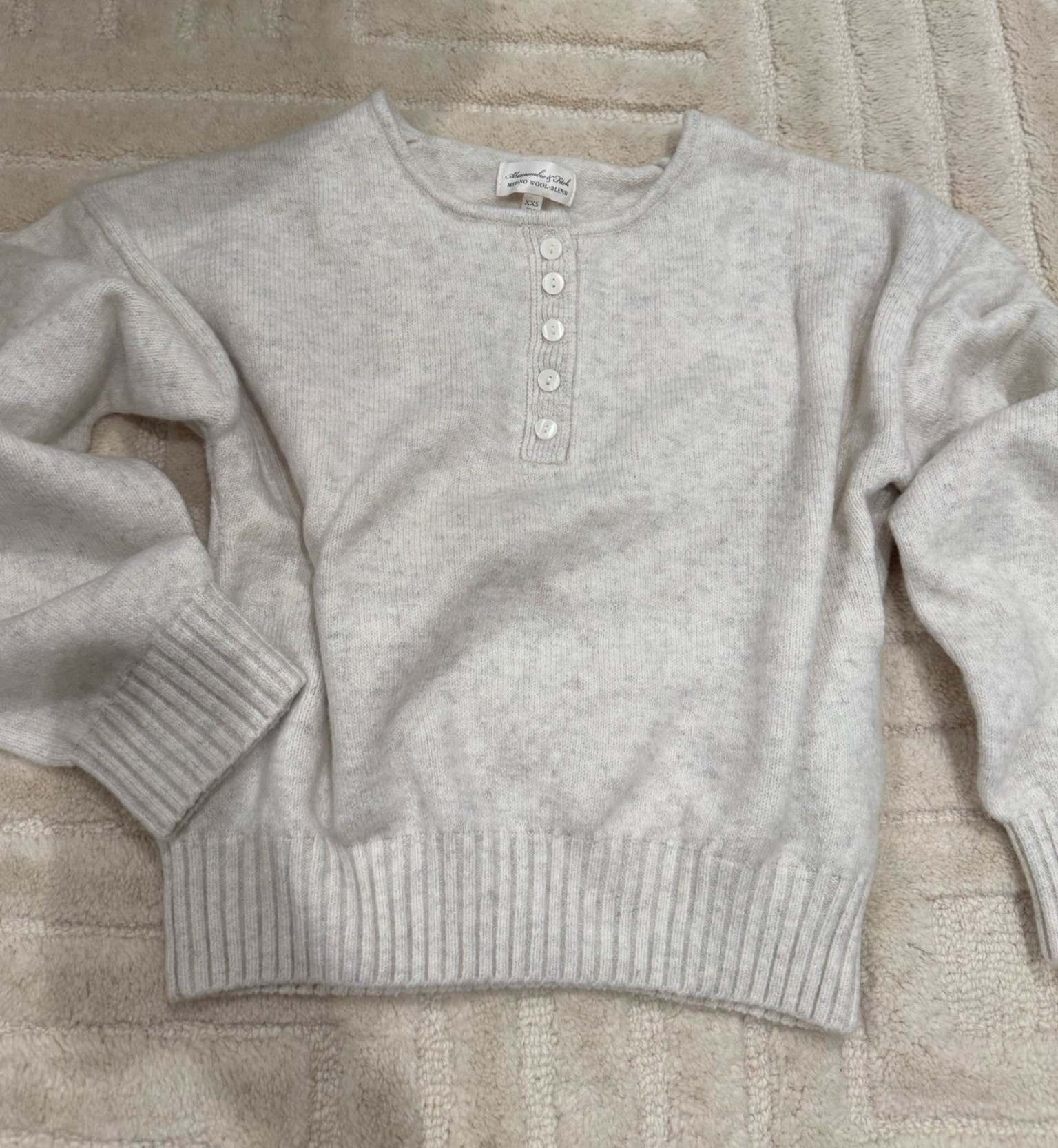 This wool Henley sweater is on sale! And going fast. Size xxs and has an oversized fit