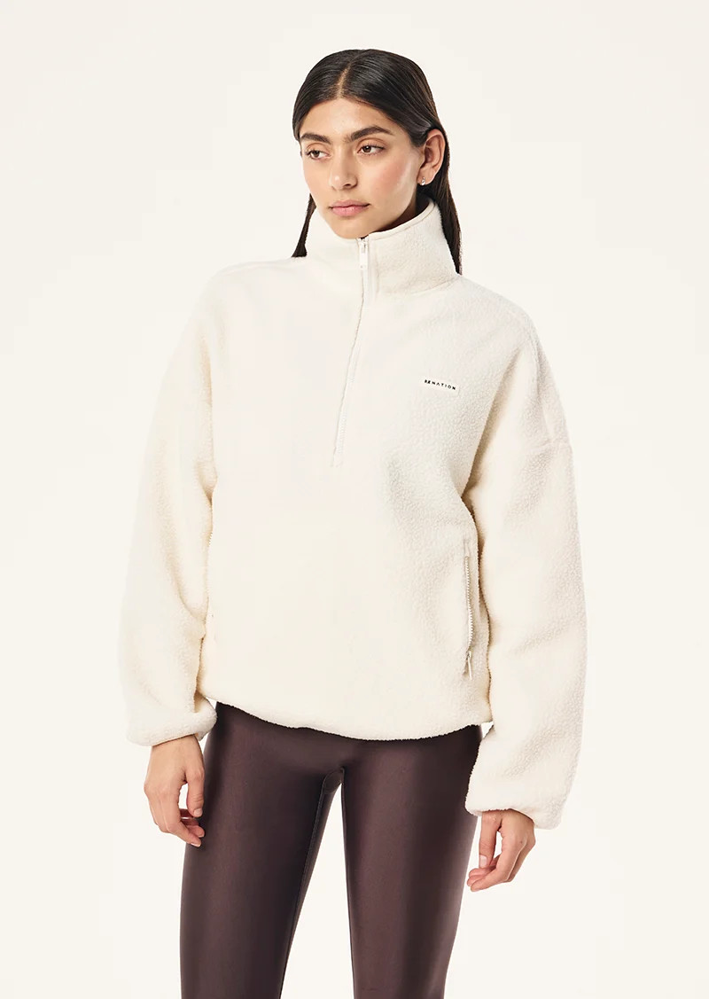 ROTATE QUARTER ZIP IN WHISPER WHITE | P.E Nation AU