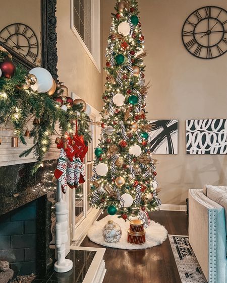 Our 2023 Christmas living room decor. 

Christmas decorations. Christmas mantle. Christmas tree. Mantle styling. Nutcracker Christmas tree. Christmas decor. Garland. Skinny Christmas tree. Fireplace decor. Cozy home decor. 

#LTKSeasonal #LTKhome #LTKHoliday