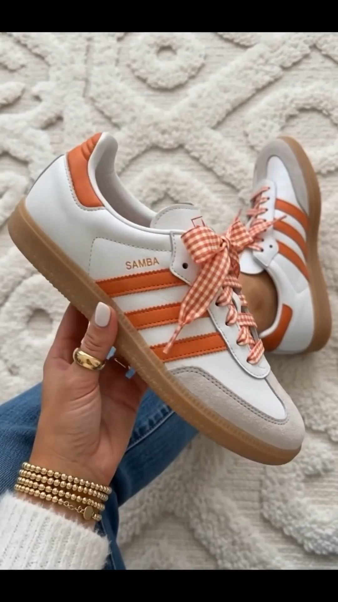 Fully back in stock in all sizes. Adidas orange samba sneakers run true to size. I bought the laces for $10