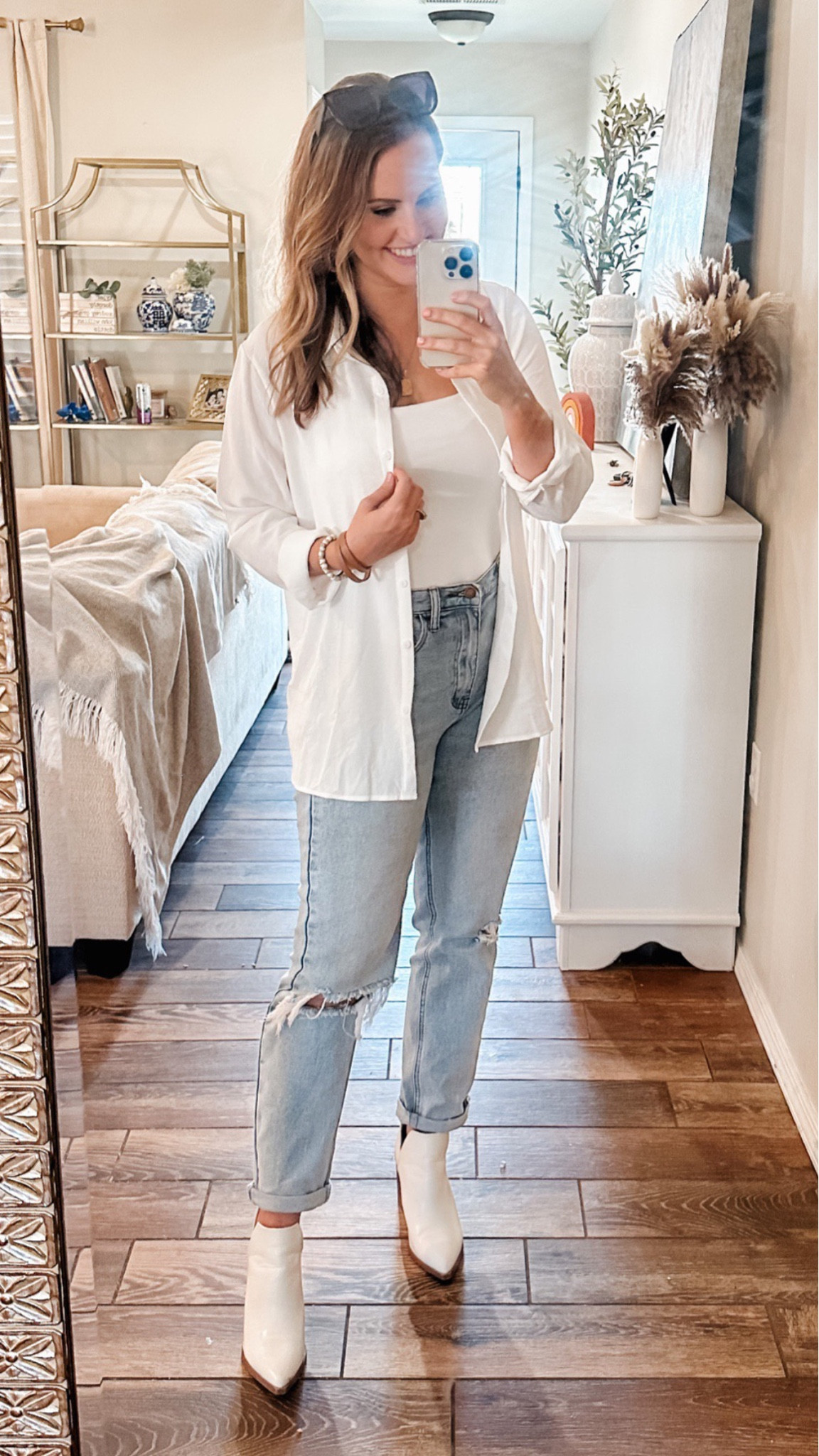 Spring outfit! Amazon fashion finds! 

Vacation look. Classic white button down, square neck bodysuit, high waisted mom jeans (similar below) & white boots.


#LTKFind #LTKunder50 #LTKSeasonal