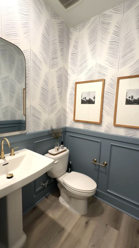 Our powder room bathroom is done!! We DIYed (for the most part) our first home project and can’t wait to do more! I loved running our ideas by you and having you help with our opinions! 

What do you think of the final result? 

Project details:

Wallpaper - Blue Palm Leaves from @livetteswallpaper 
Wallpaper Installation - @daniel_wallpaper_installer_la 
Paint Color - Hamilton Blue from @dunnedwards 
Mirror & Frames - @target 
Bath Accessories + Materials - @homedepot + @dewalttough 


#LTKfamily #LTKhome #LTKVideo