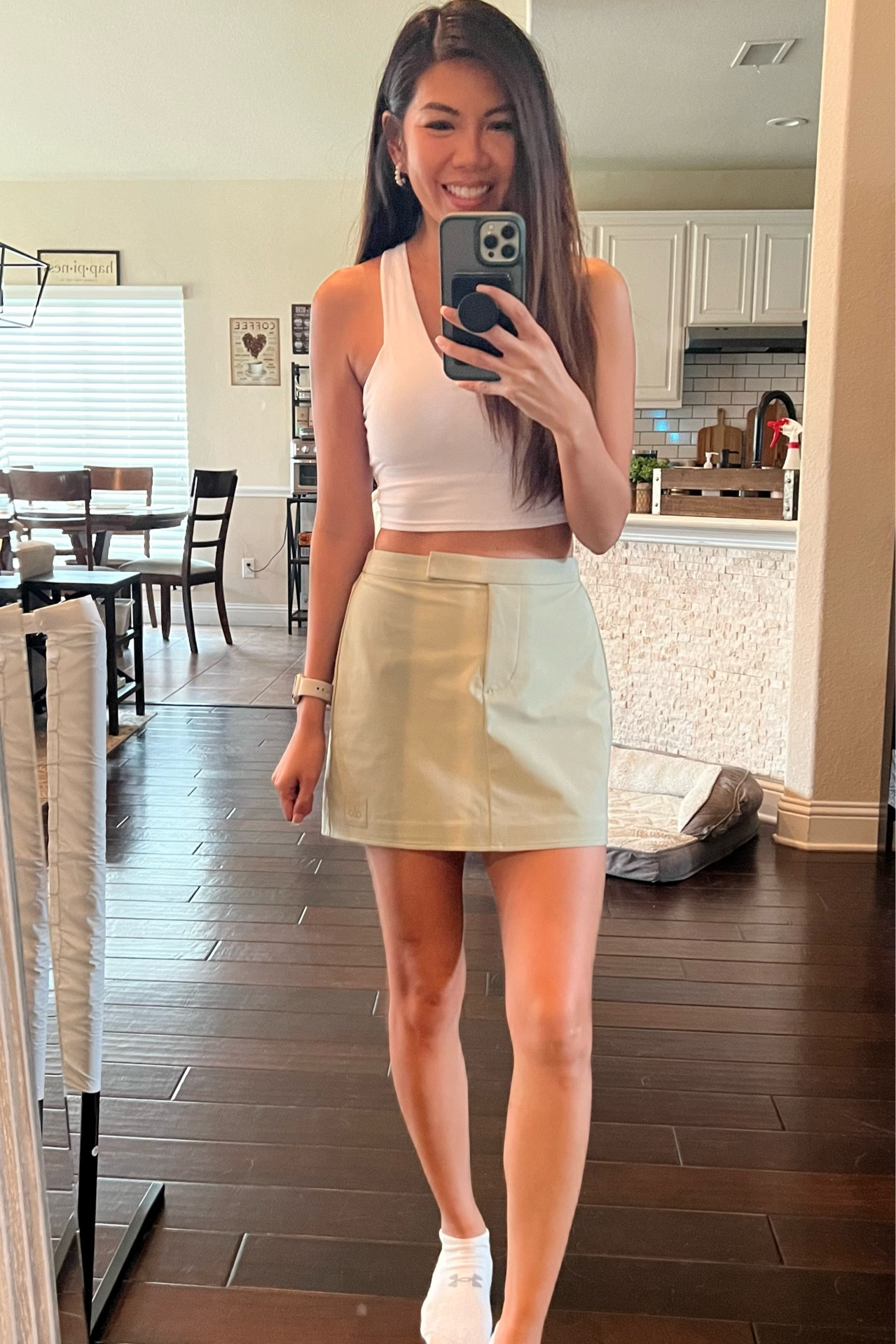 White Alo tank small
Limestone green Alo mini skirt, size x-small 