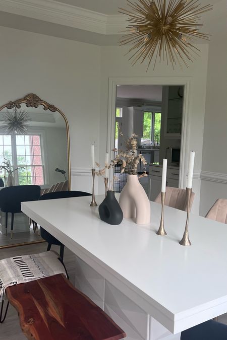 Modern natural decor in dining room. Featuring cream and black modern vases, gold chandelier and candle holders andD floor gold mirror.

#LTKhome #LTKFind