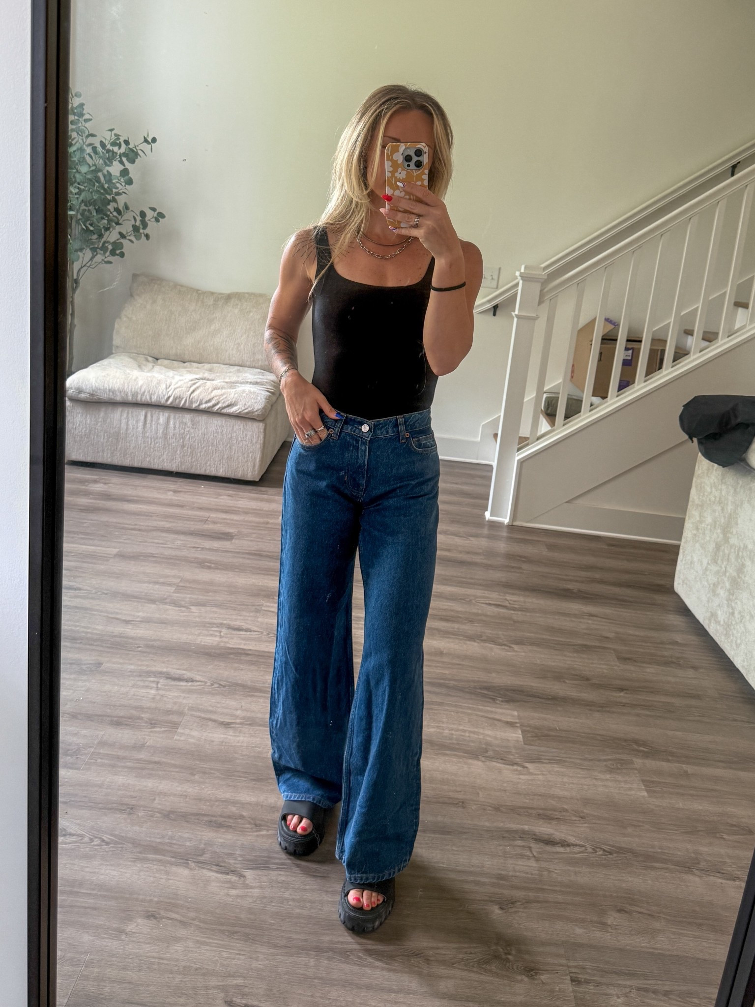 Size 24 in jeans, XS in bodysuit 