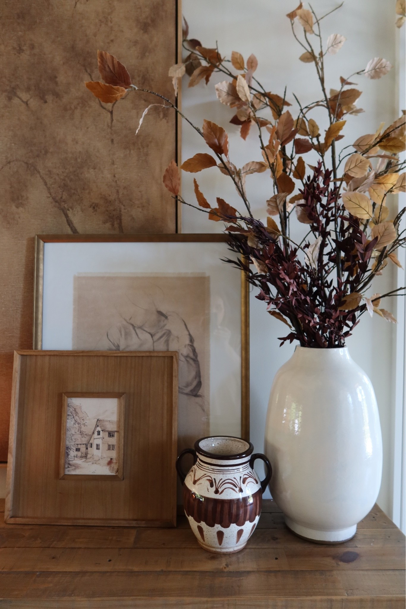 Easy swaps I made around my home to warm up our space for fall! Added some new artwork ($30 from Target!), fall stems, vases, etc! The stems shown here are a mix- the tall leafy ones are from Crate & Barrel (linked) and the dark eucalyptus is old from Target. 

Fall decor || fall home || home styling || cozy fall decor ||

#LTKHome #LTKSeasonal